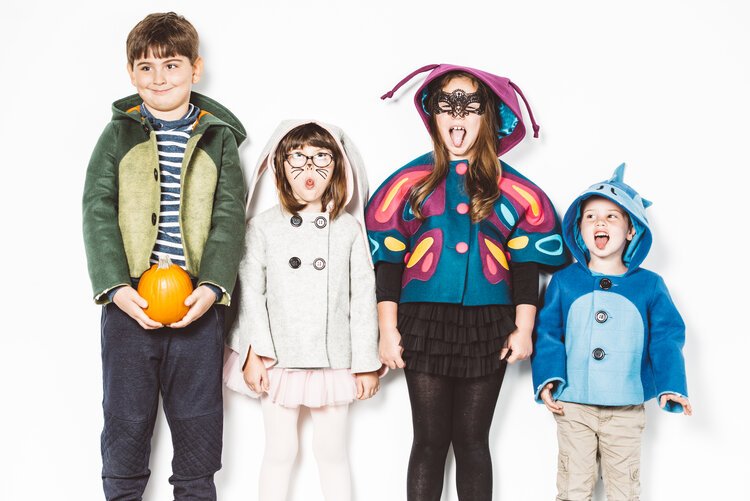 A group of children in costumes, posing for a studio children&#39;s photography session in Portland.jpg