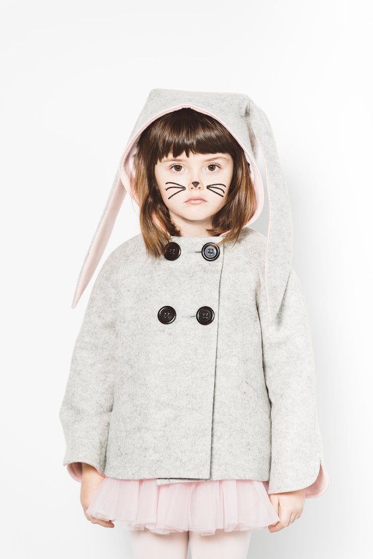 An adorable girl dressed as a bunny, photographed by the best children photographer.jpg