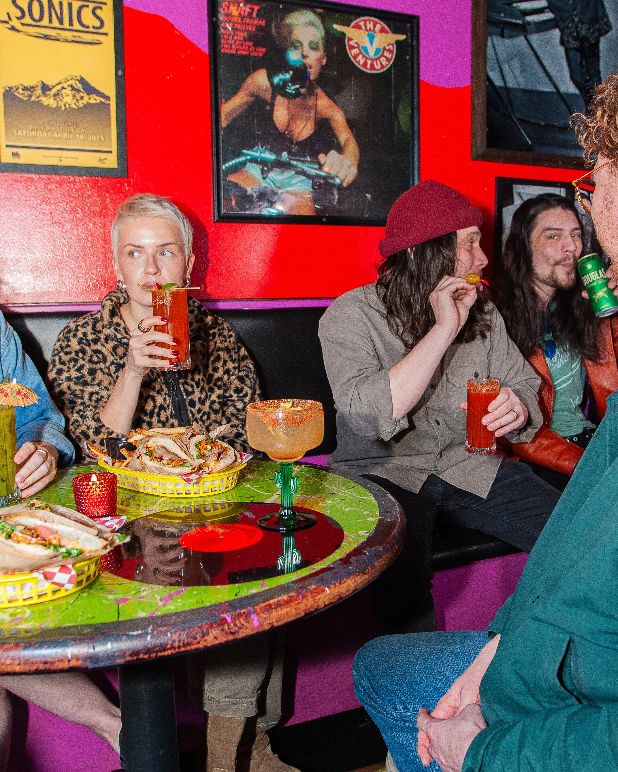 People enjoying food and cocktails