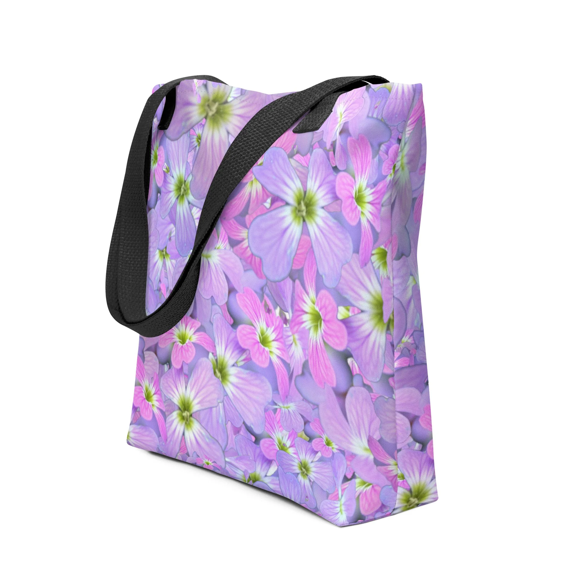 Spacious, trendy, and durable – the Lavender Bloom Tote Bag is perfect for errands, shopping, or everyday style. 100% polyester with sturdy cotton handles.