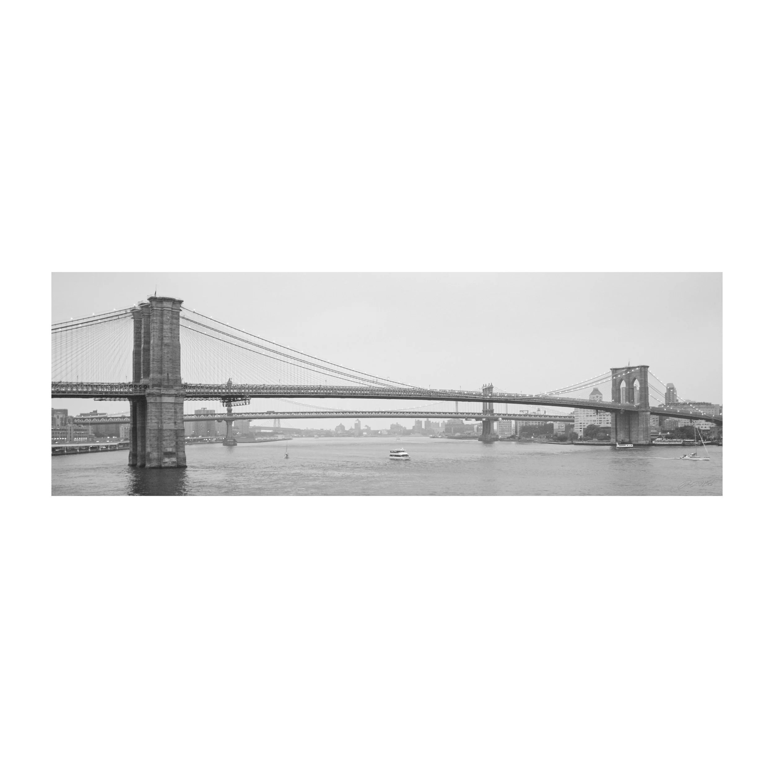 Black-and-white panoramic fine-art photograph of the Brooklyn Bridge and Manhattan Bridge crossing New York City’s East River.