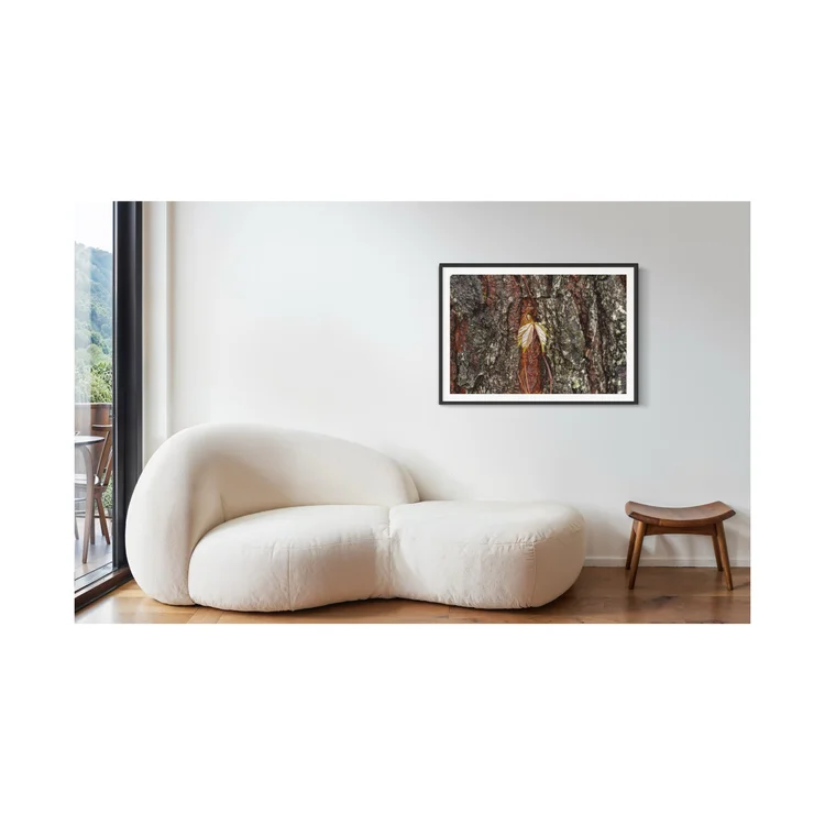 Golden Leaves artwork framed beside a white chair in a room mockup