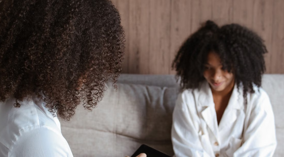 Who should I talk to instead of using an AI sex coach for relationship and intimacy problems?