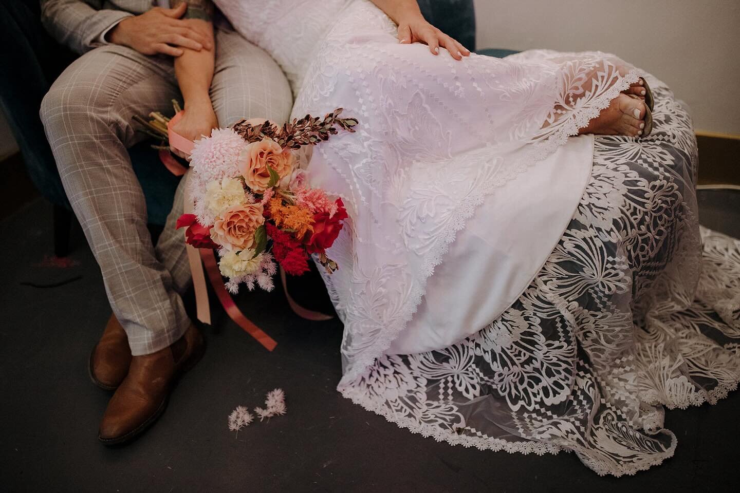 This could be you&hellip;. lying on our couch schmoochin your ride or die 💀⚡️💒🖤

Come and sign on the dotted line in Gosfords ONLY chapel of love&hellip; 📝🫶🏻

Stunning dress @muse.bridal 
Stunning flowers @the_petalsisters 
Stunning bride @karl