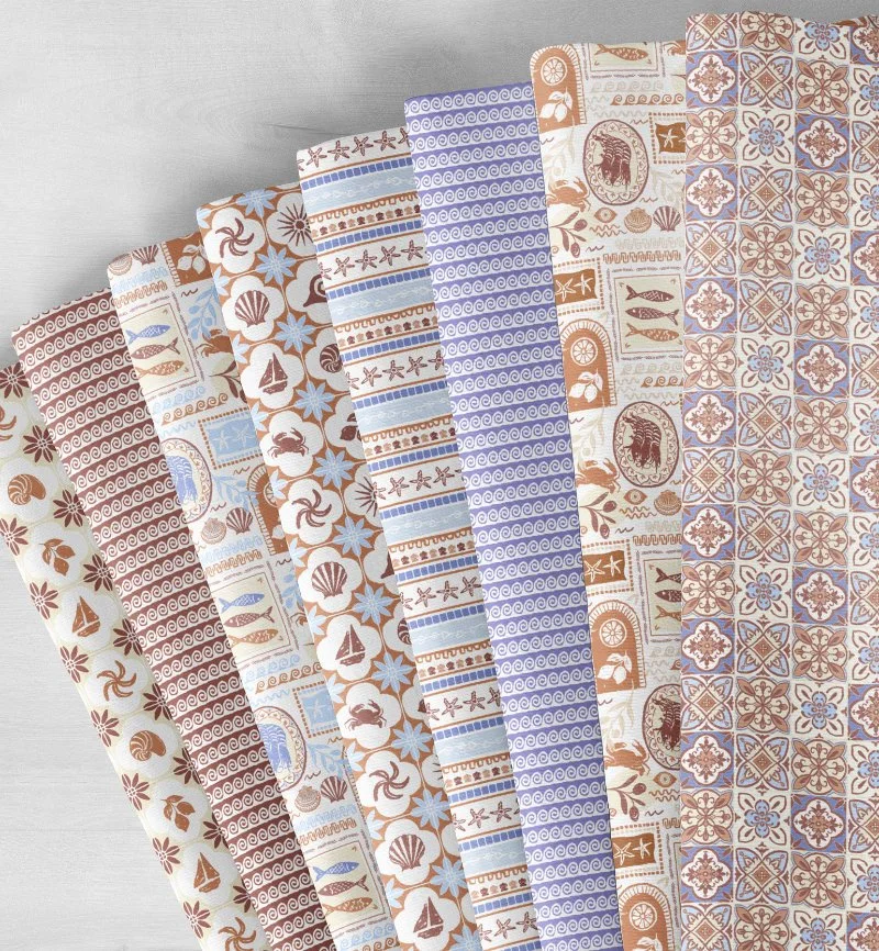 fabric stack with mediterranean coastal design in blue white and browns