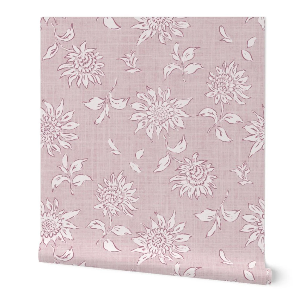 vintage blockprint sunflowers in soft blush pink on rustic linen textured background shown on wallpaper roll