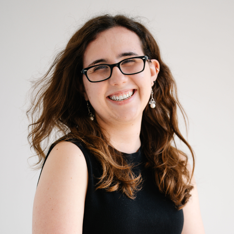 Abigail wearing glasses and smiling