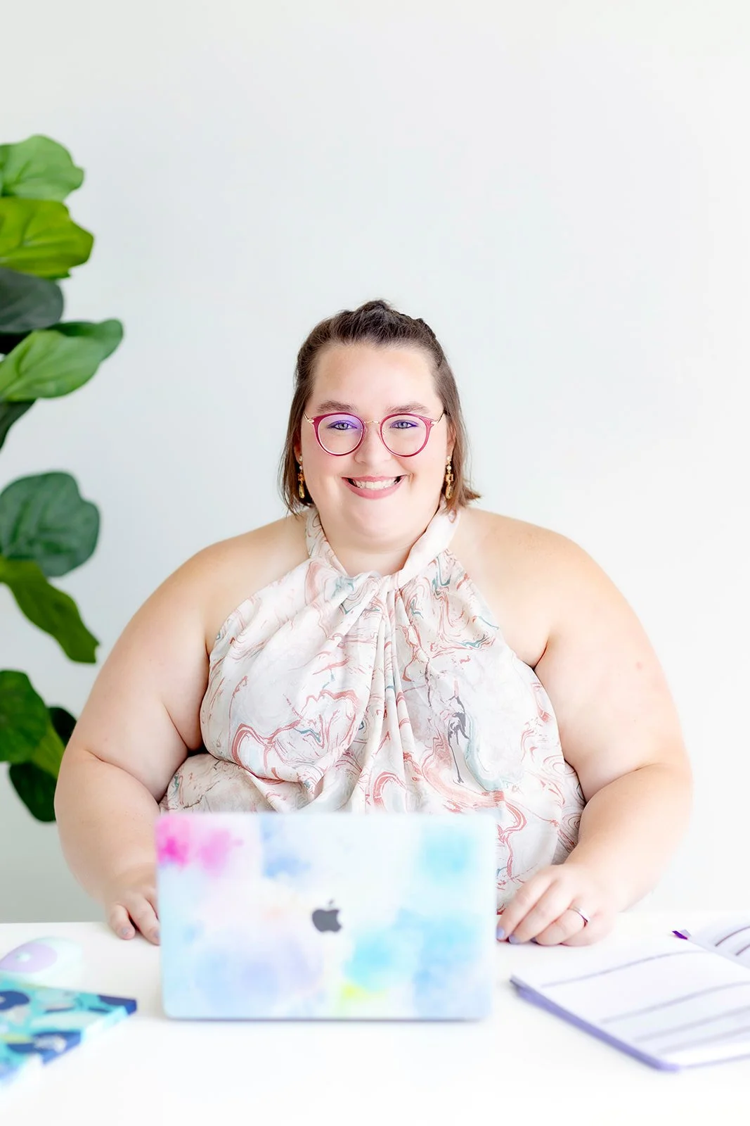 Sammy Bohannon sitting at desk with computer