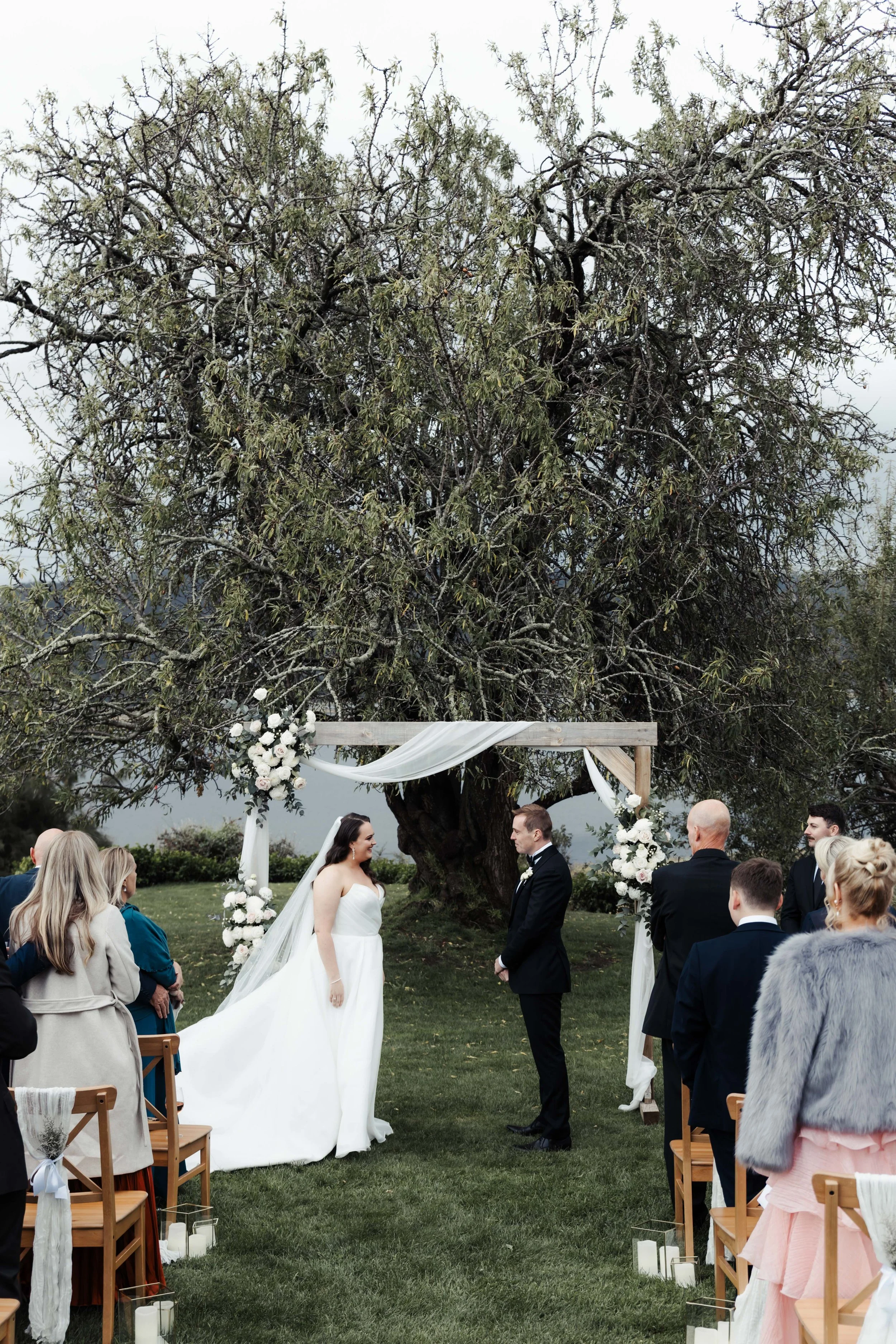 Wedding photography in Hobart, Tasmania.  Happy bride and groom photos taken by Finding Happy Photography at the Derwent Estate winery.