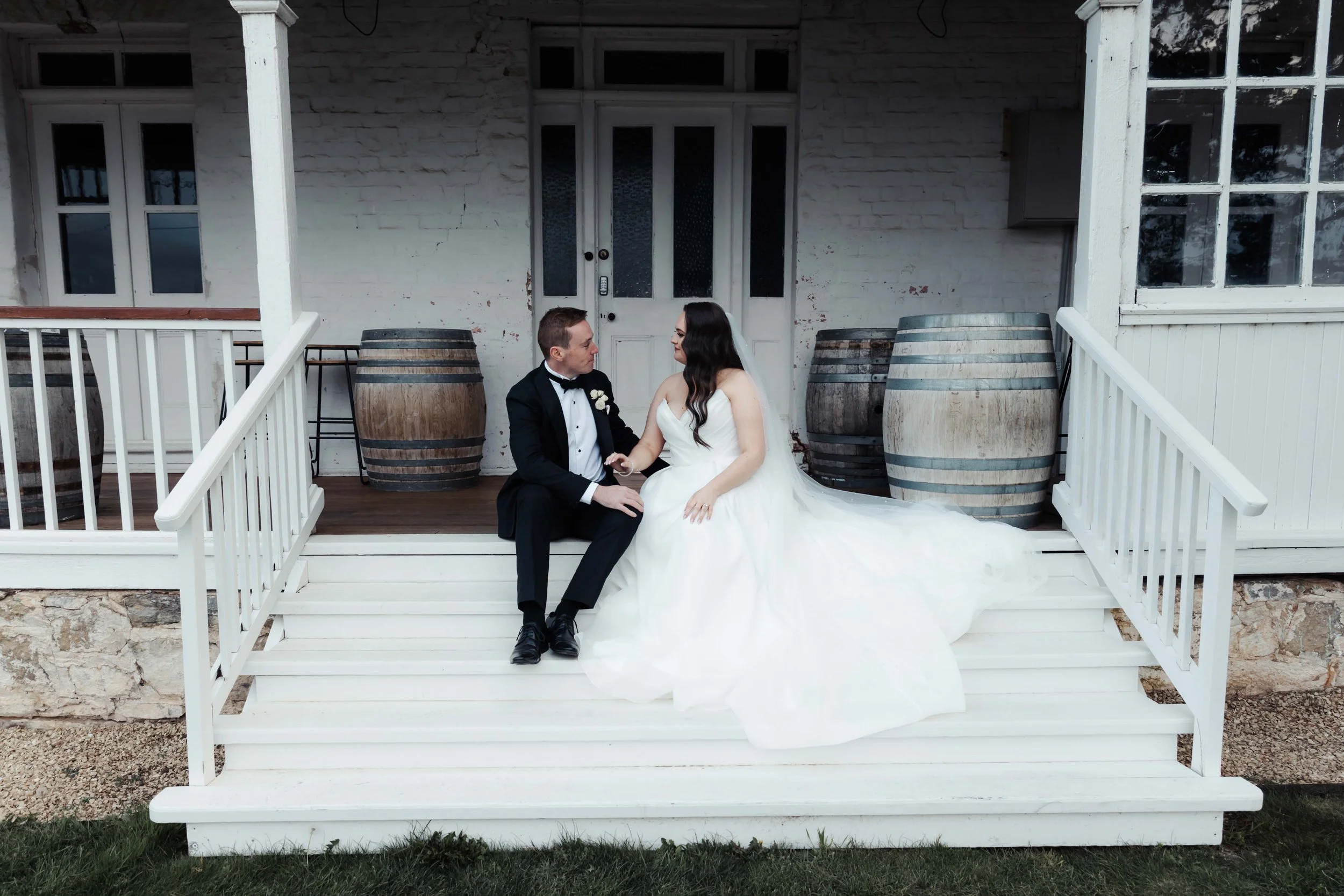 Wedding photography in Hobart, Tasmania.  Happy bride and groom photos taken by Finding Happy Photography at the Derwent Estate winery.