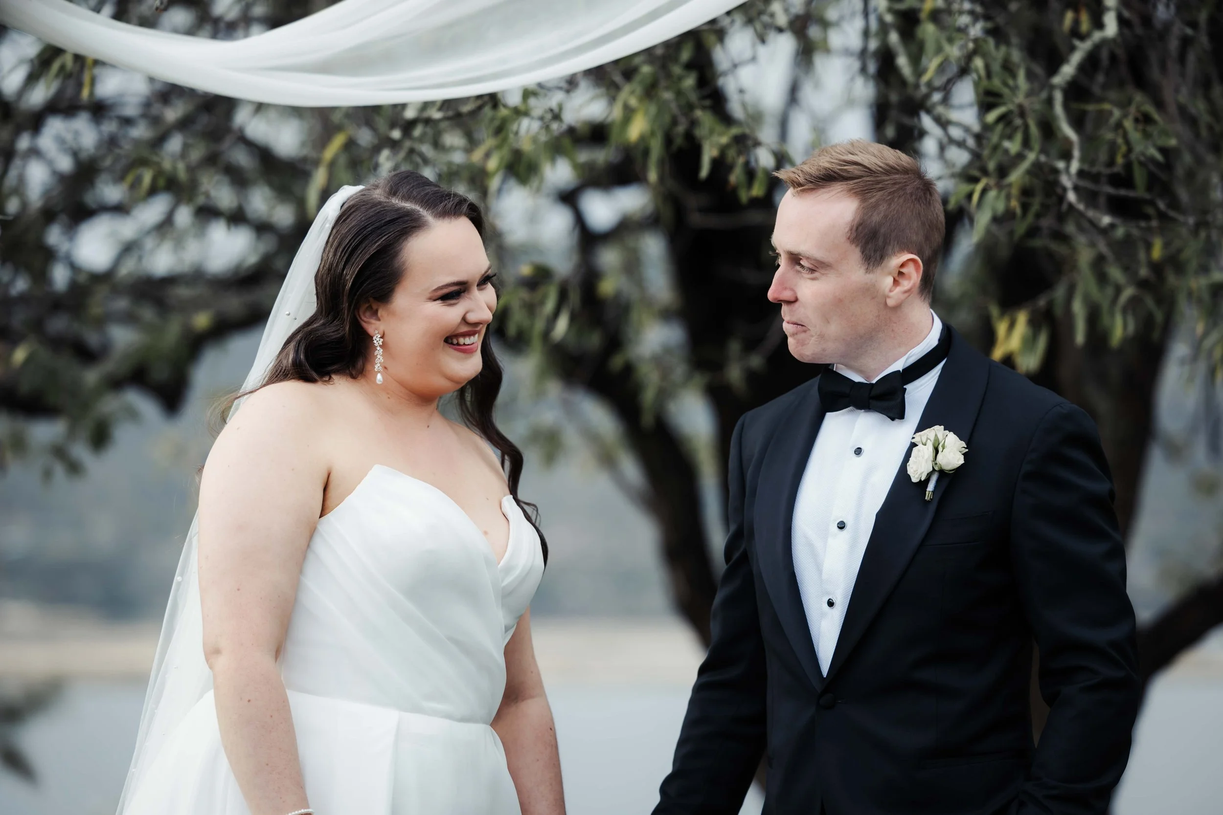 Wedding photography in Hobart, Tasmania.  Happy bride and groom photos taken by Finding Happy Photography at the Derwent Estate winery.