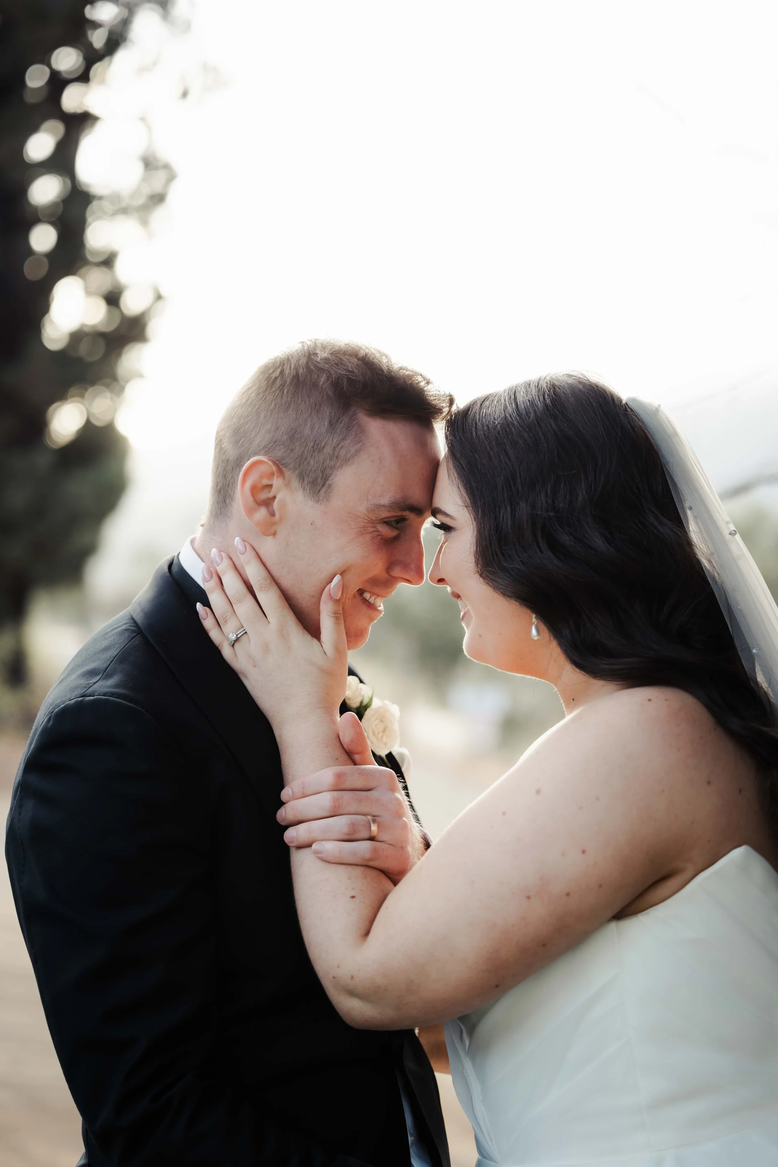 Wedding photography in Hobart, Tasmania.  Happy bride and groom photos taken by Finding Happy Photography at the Derwent Estate winery.