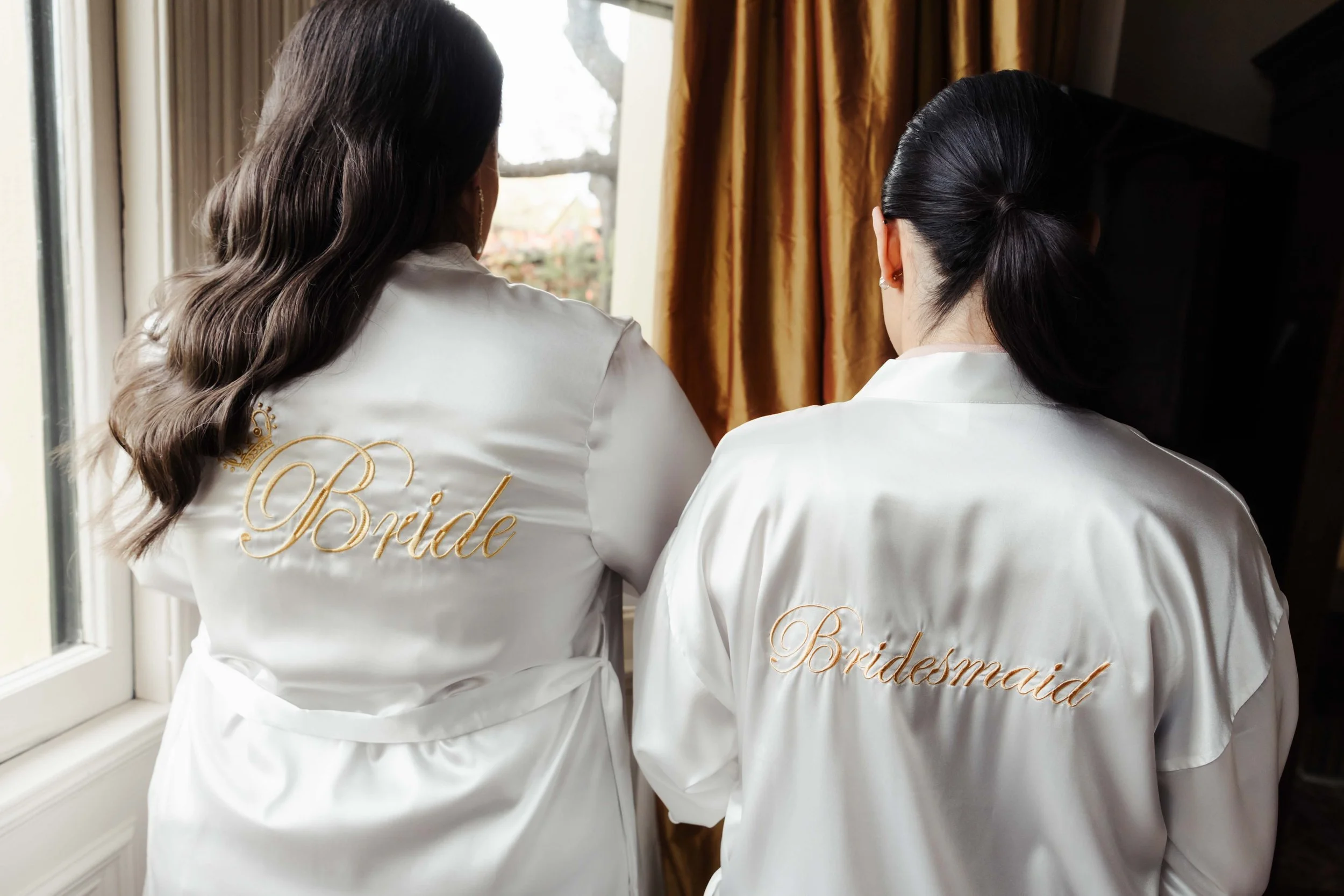 Bride and Bridesmaid in matching gowns at a wedding in Hobart, Tasmania
