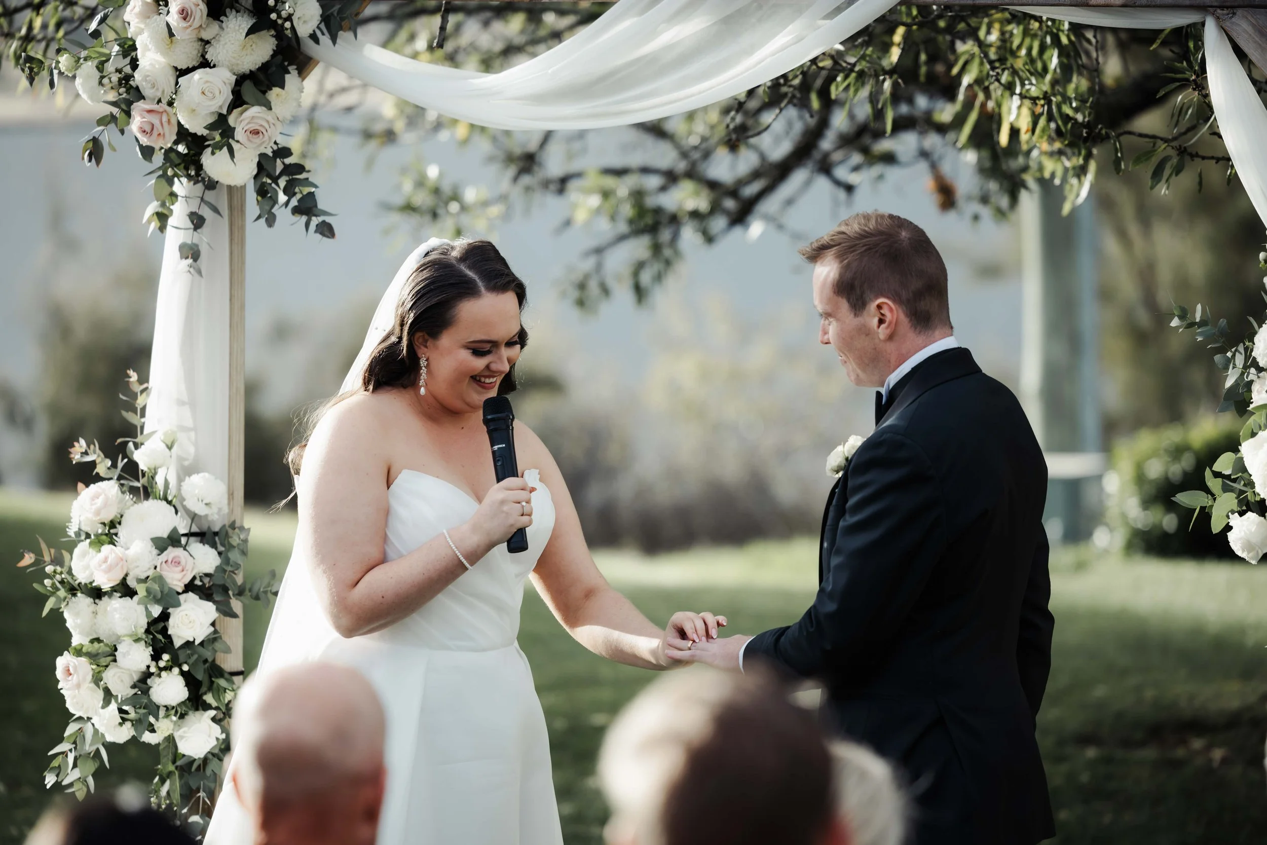 Wedding photography in Hobart, Tasmania.  Happy bride and groom photos taken by Finding Happy Photography at the Derwent Estate winery.