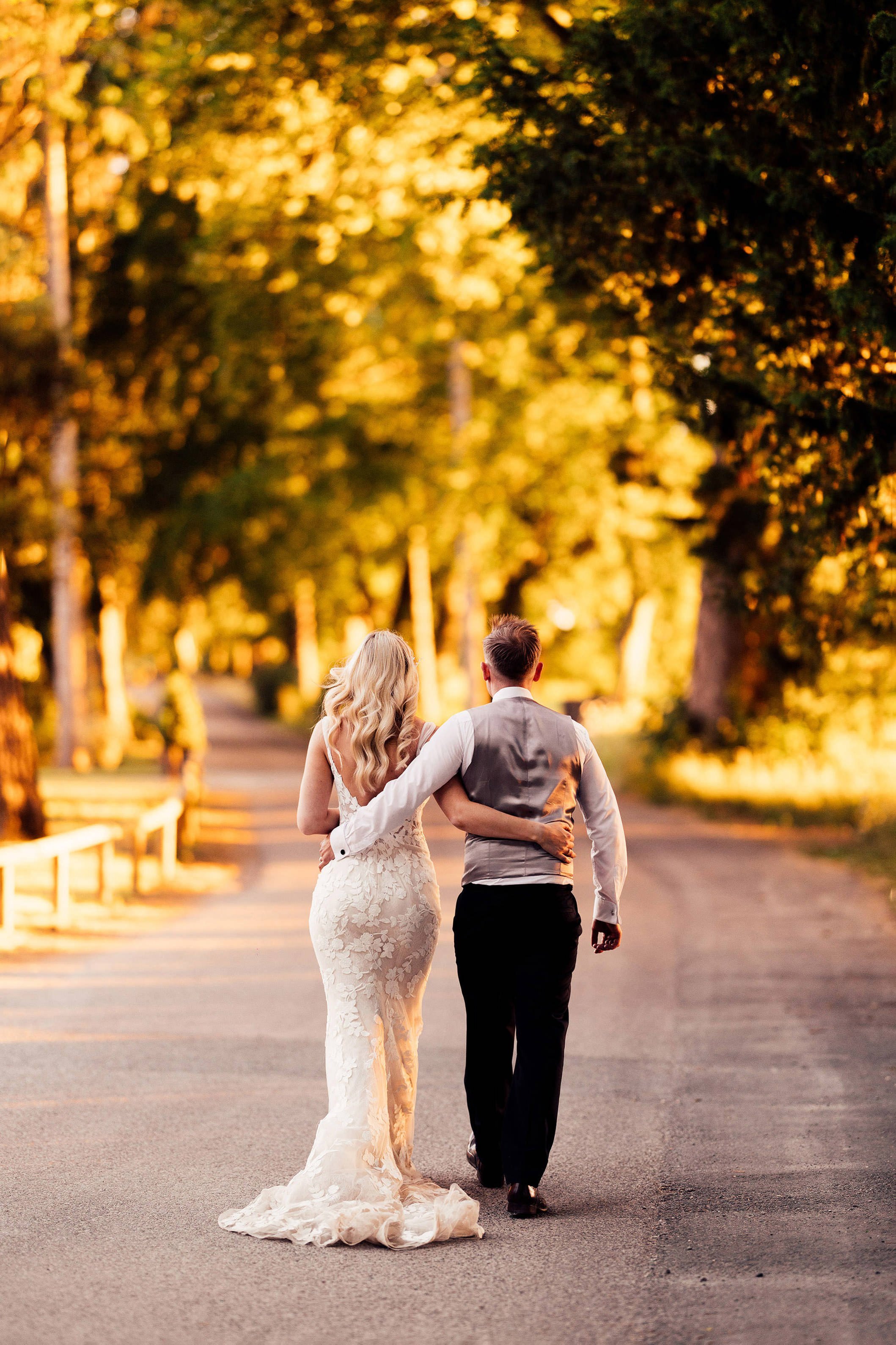 couple walking in sunset at Middleton lodge wedding Yorkshire