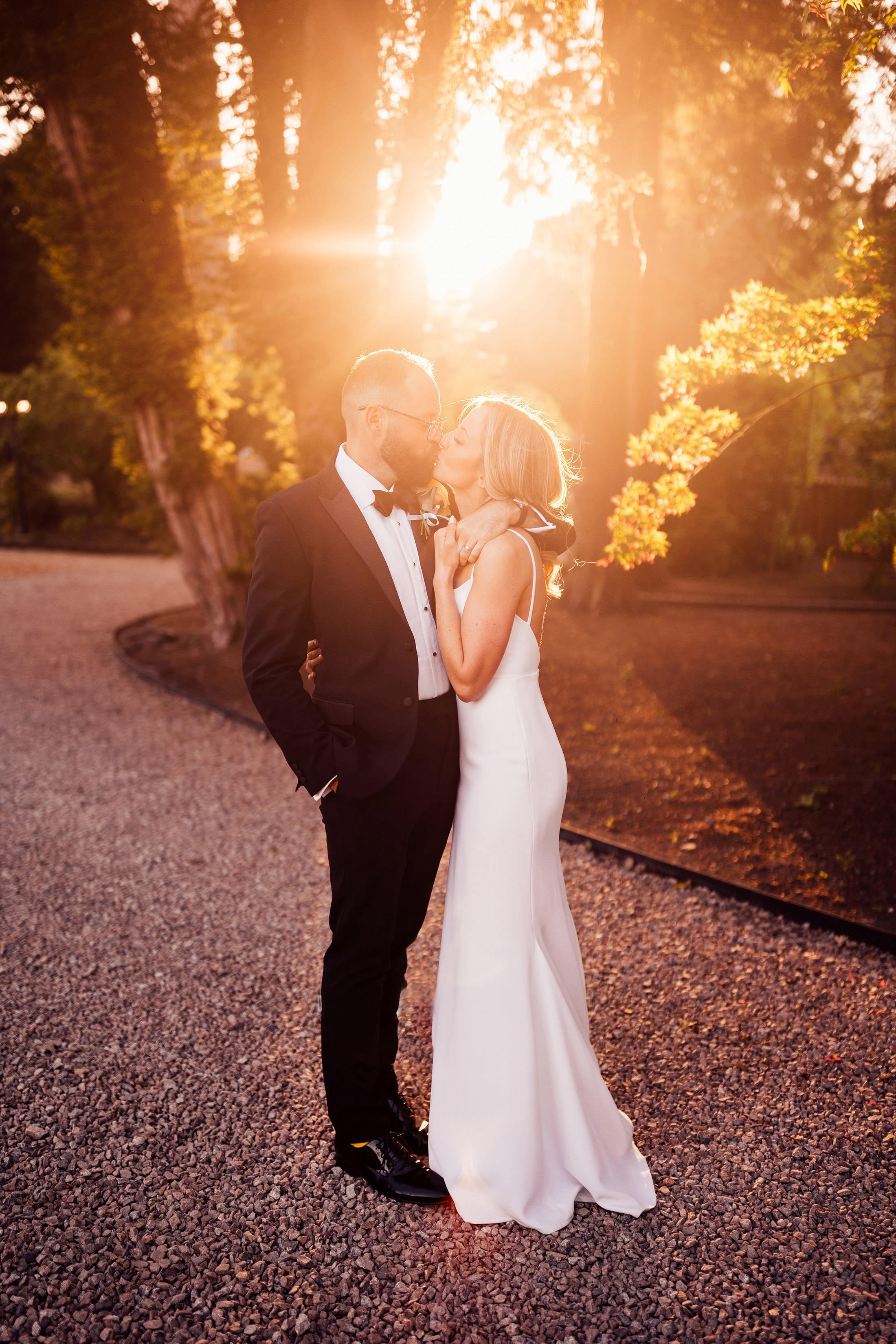 golden hour couple portrait with bride in silk dress