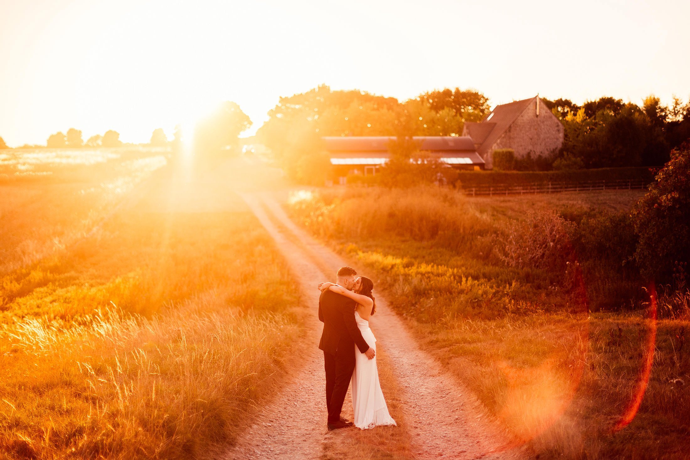 golden hour portrait at couples stone barn wedding cotswolds