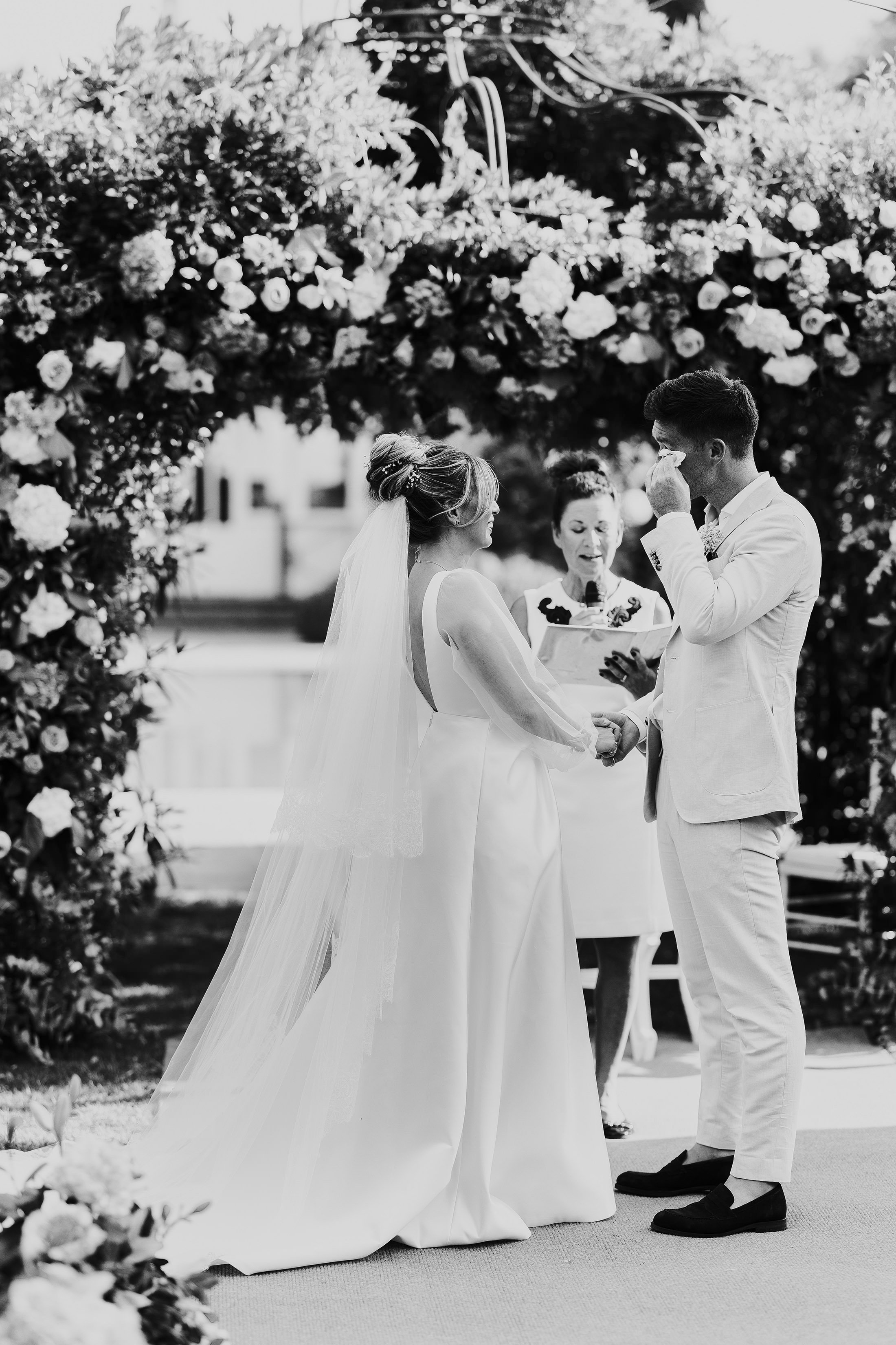 groom gets emotional at outdoor ceremony Spain finca monasterio