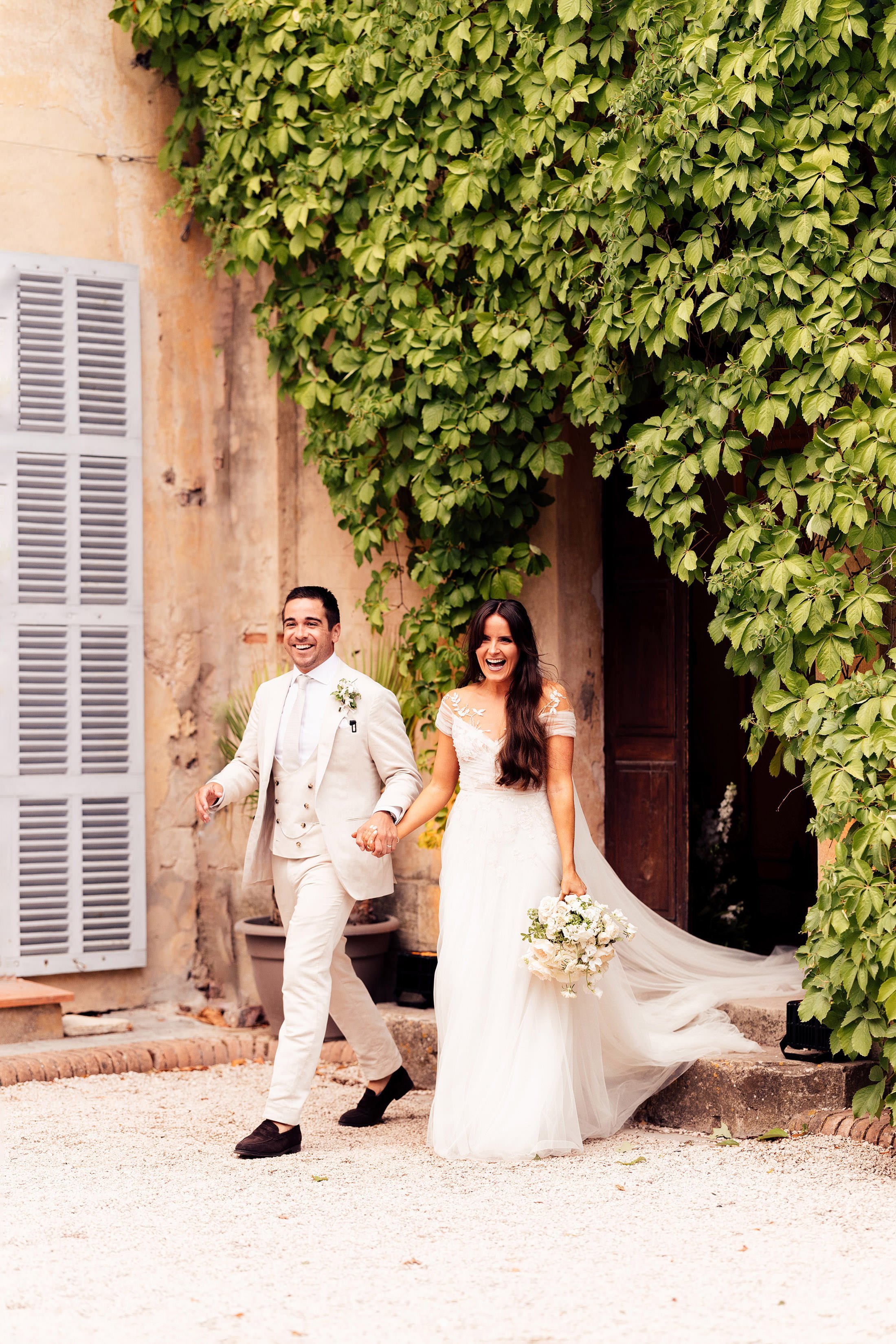 couple enter south of France wedding reception
