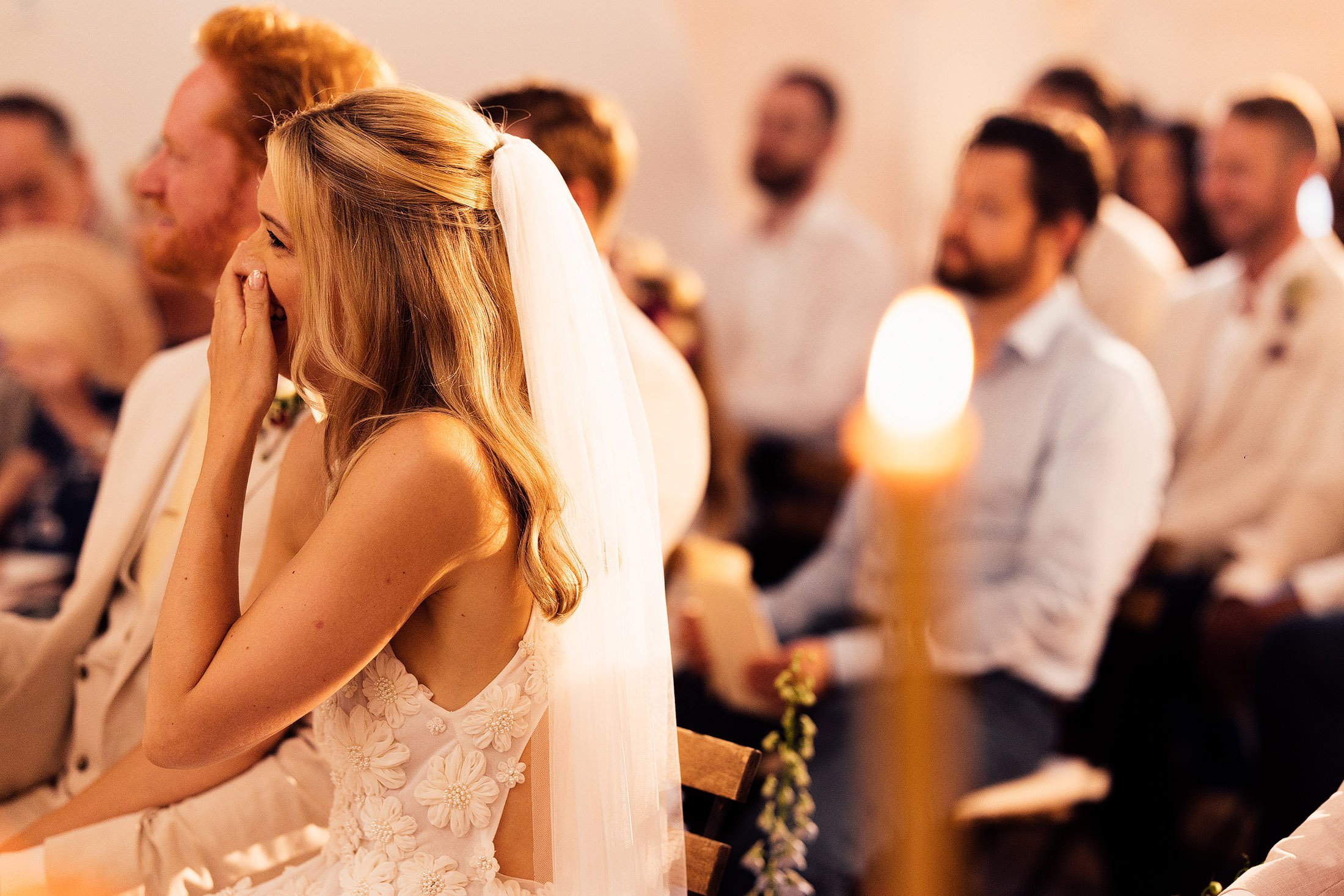 bride laughs during ceremony at masseria mangimuso