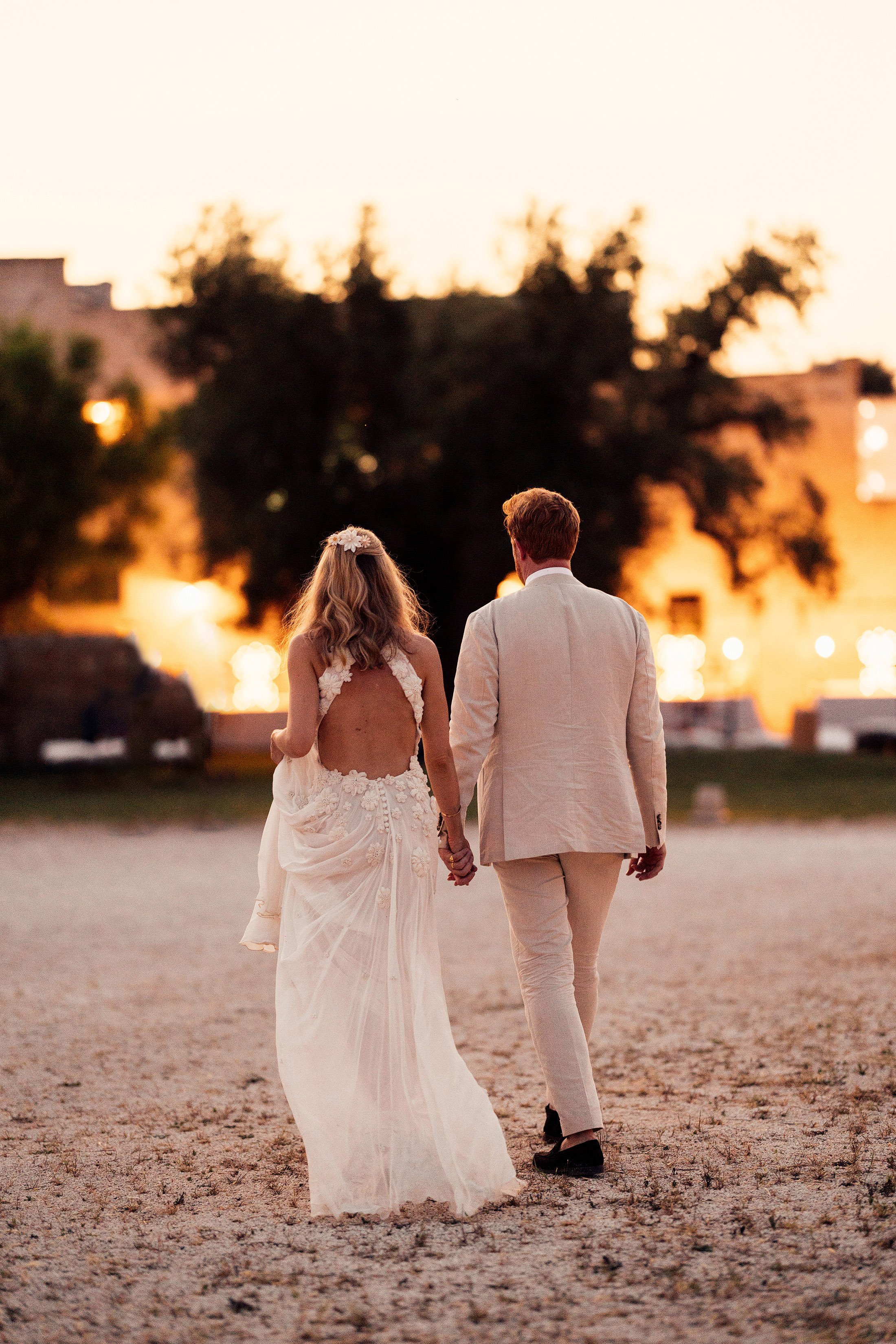 couple walk in sunset in Puglia 