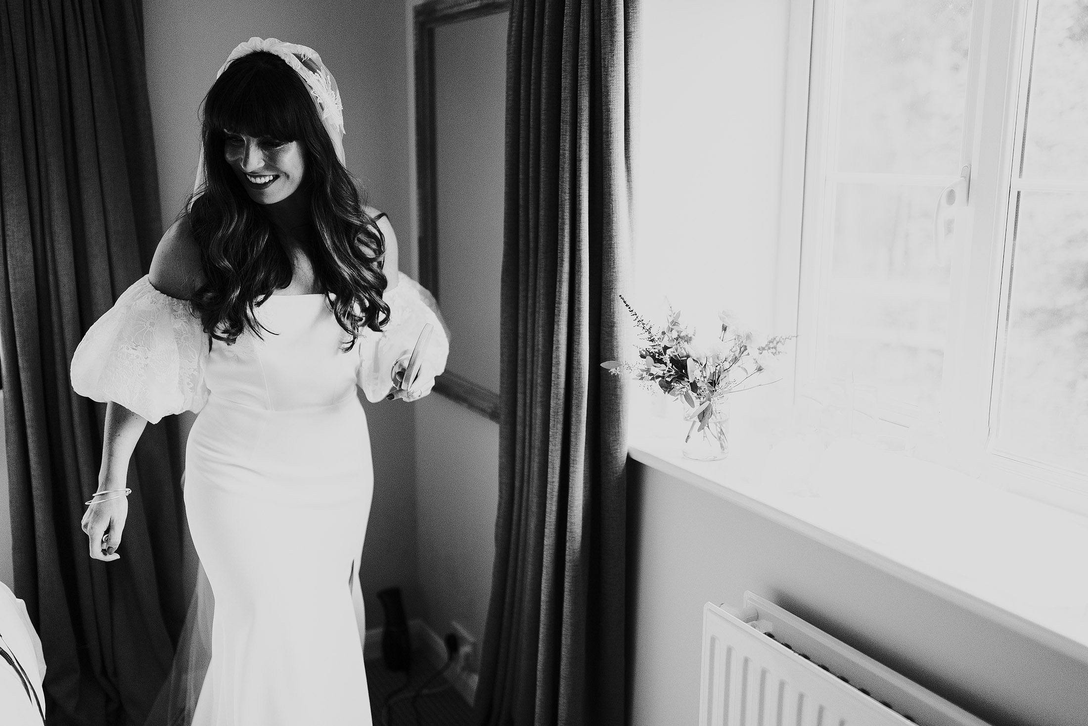 black and white portrait of bride in rime arodaky dress