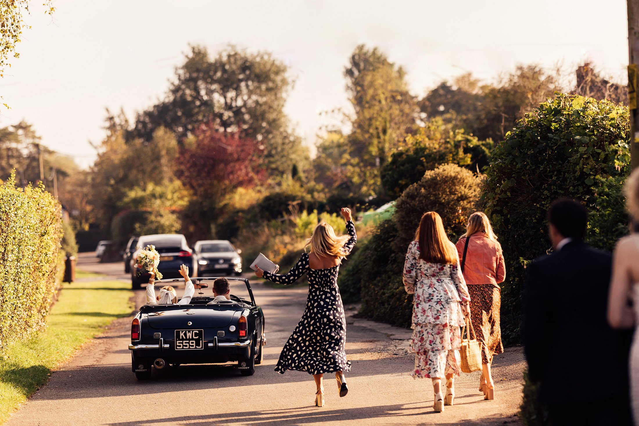 couple exit in vintage car