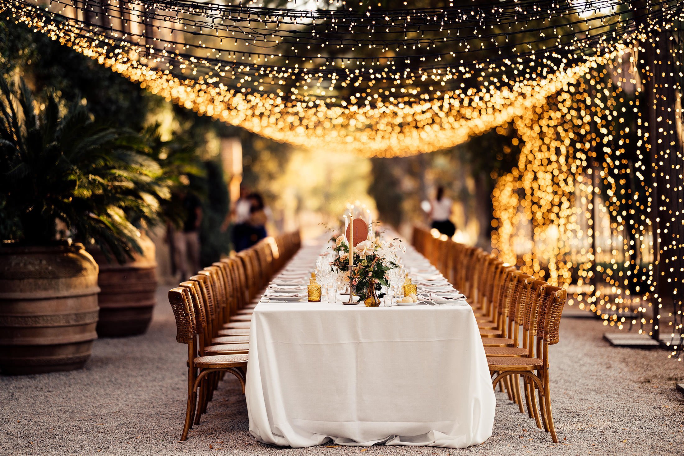 stunning outdoor table set up at la Pescaia resort with fairy lights