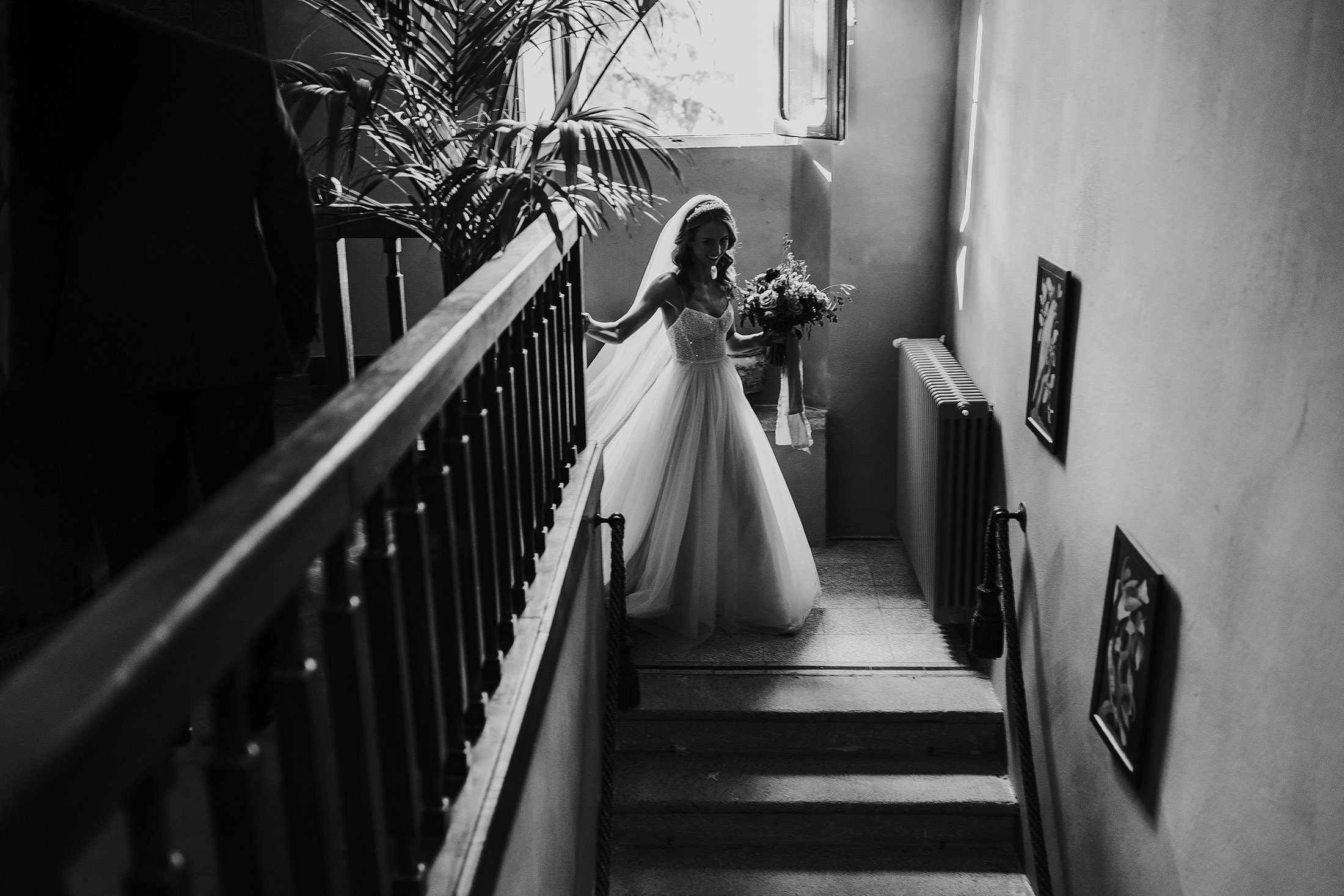 bride walks down stairs at la Pescaia resort 