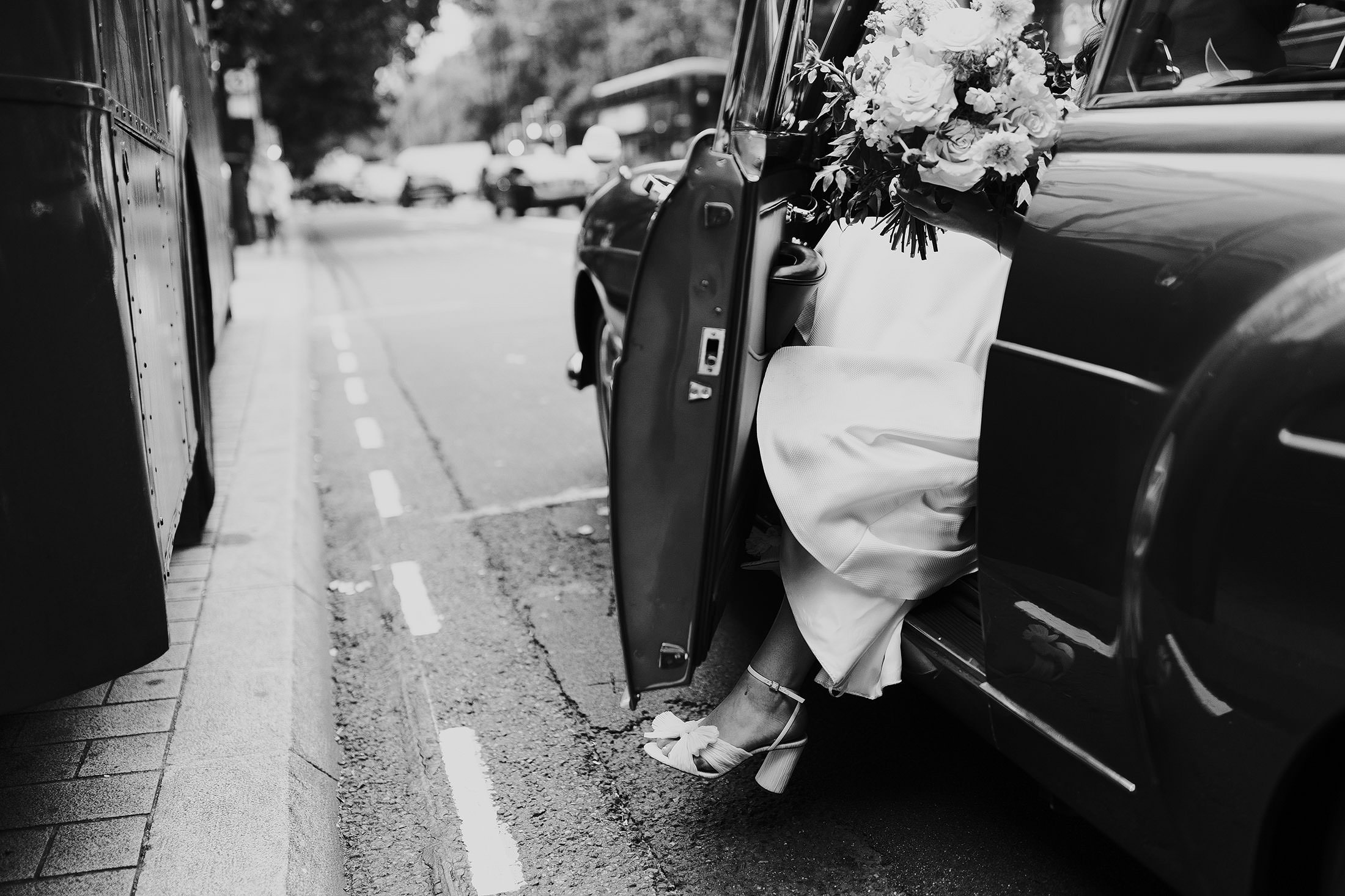 bride arriving at town hall in vintage car