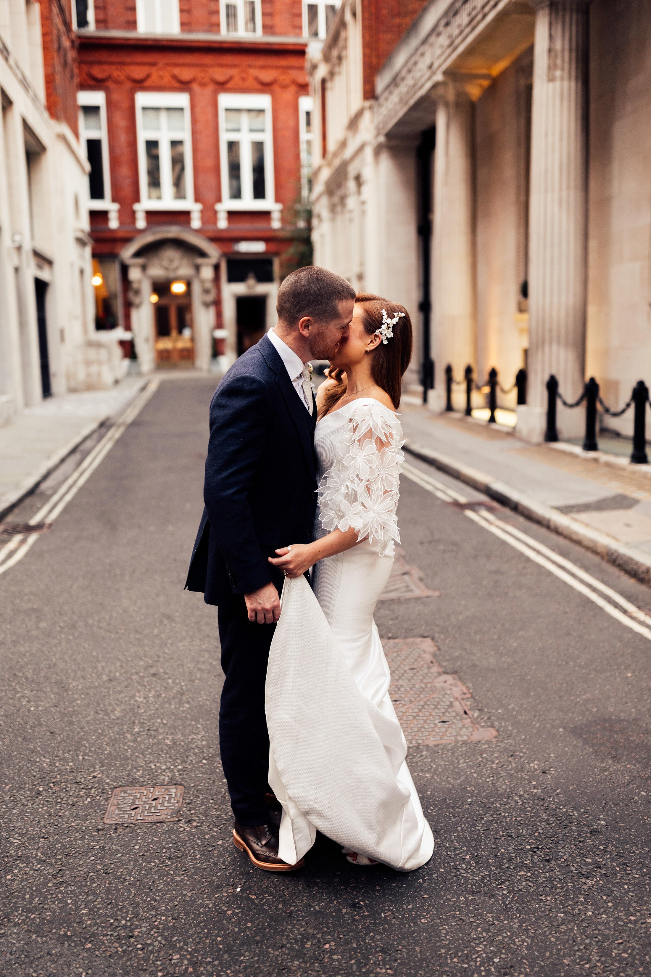 couple kiss outside the ned London