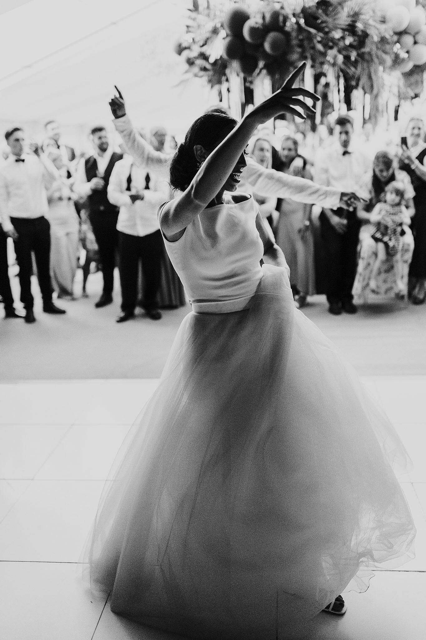 bride dancing in Jesus Piero dress