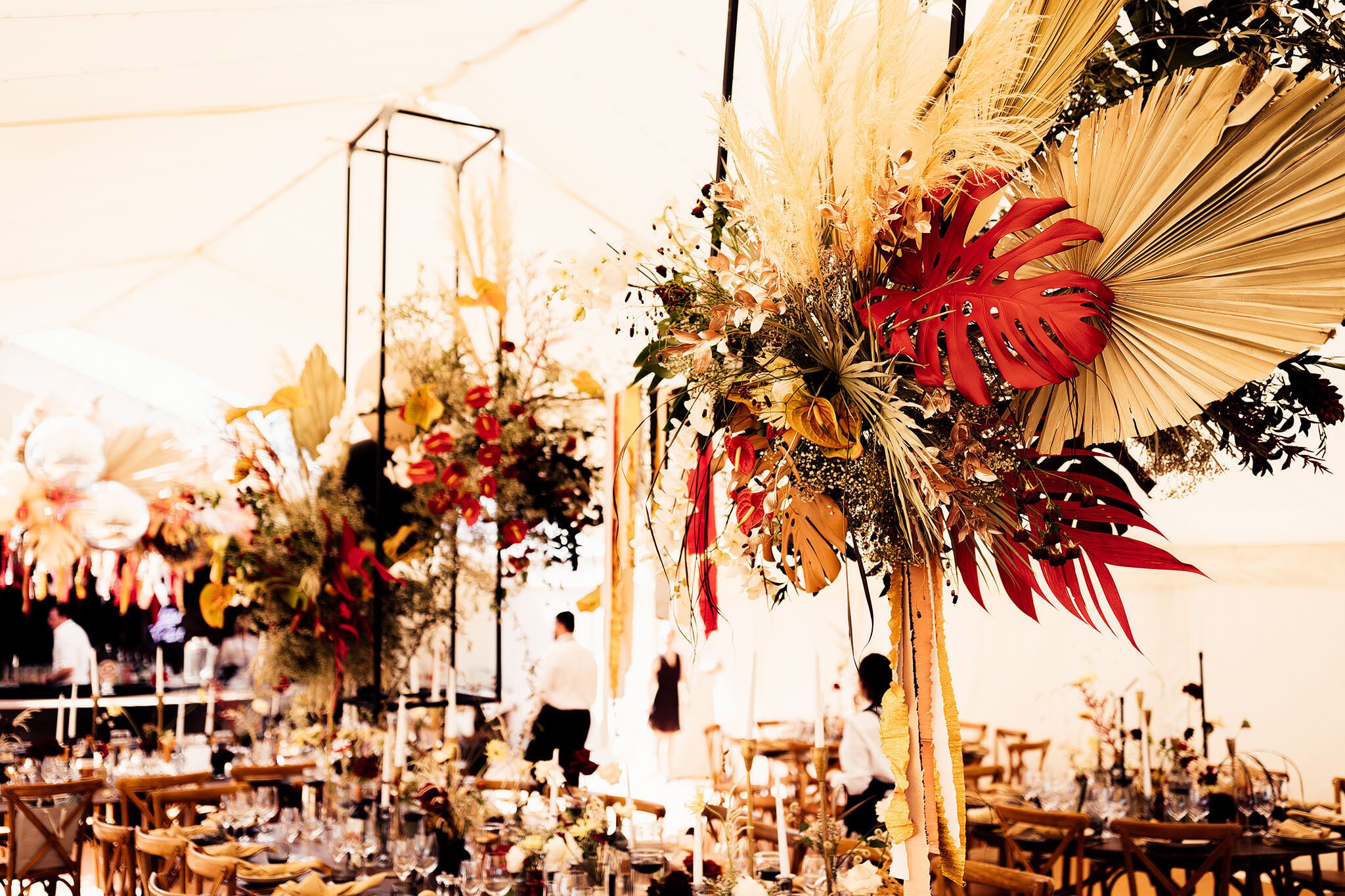 marquee decor with wild florals 