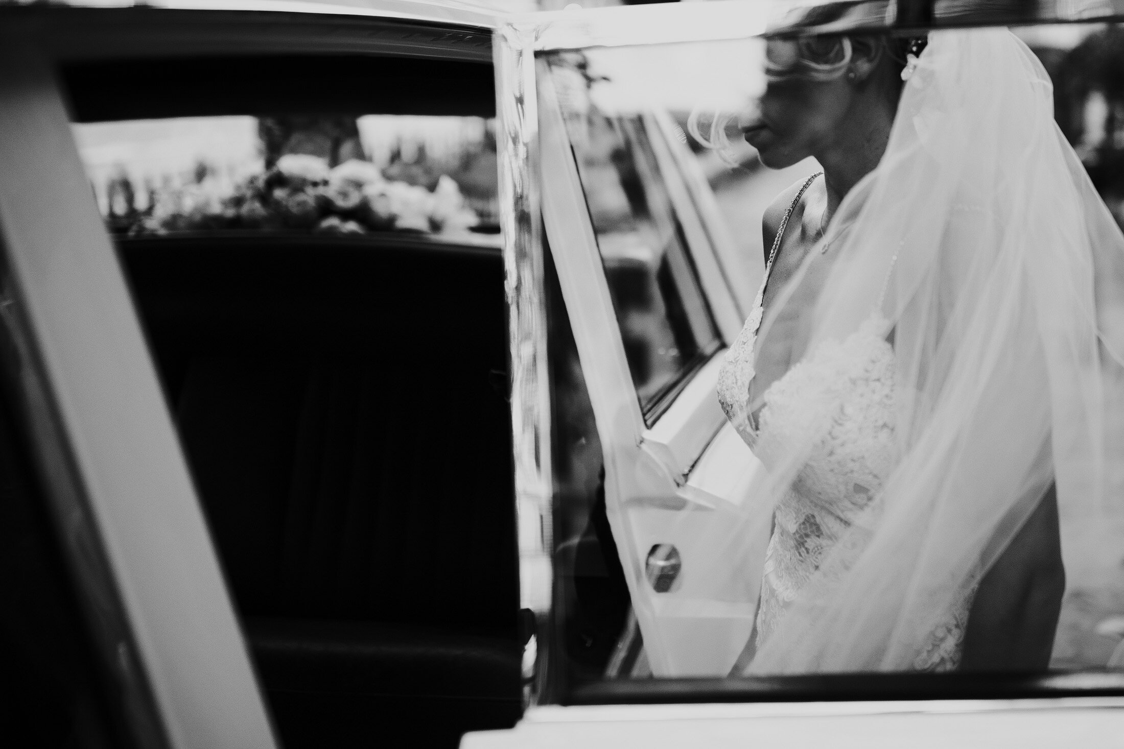 bride enters wedding car at landmark London