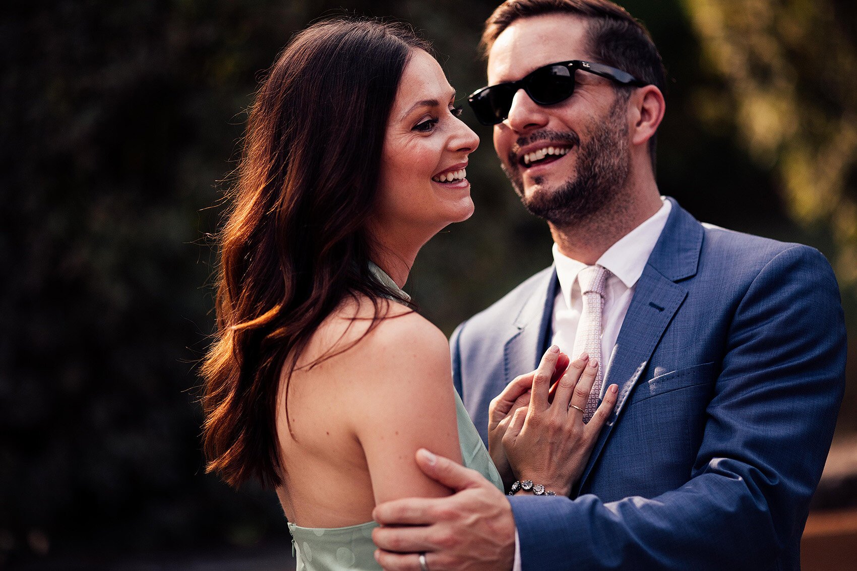 guests hug outside borgo corsignano