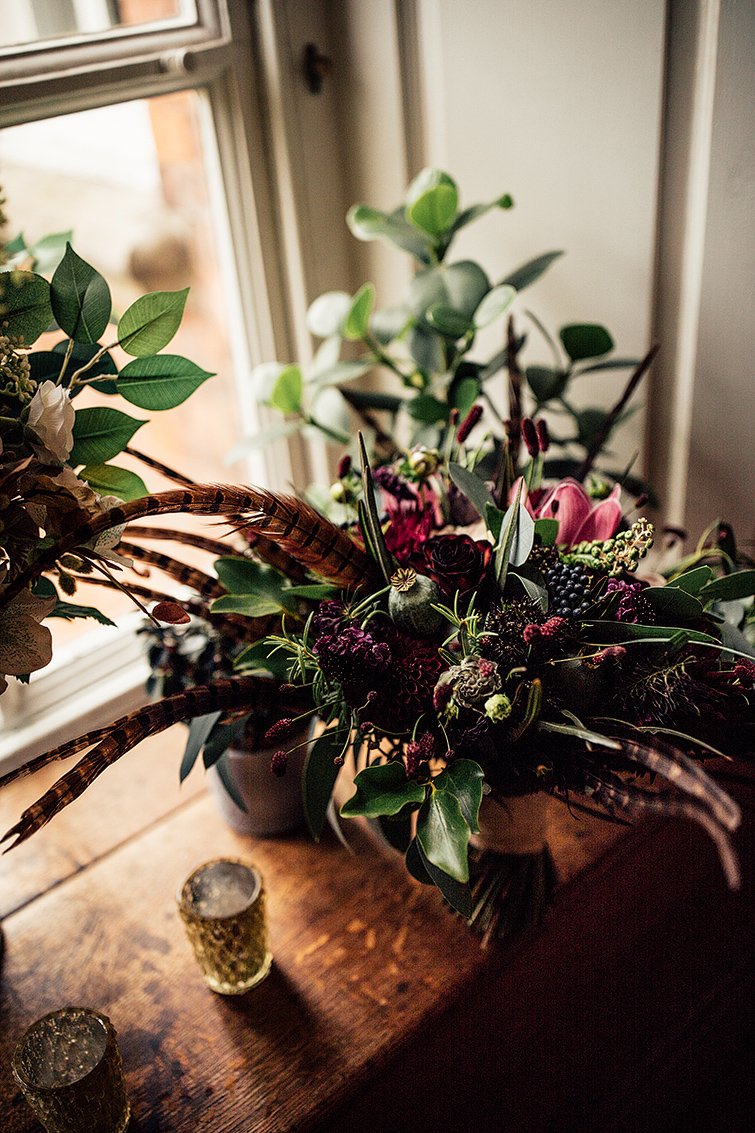 autumnal wedding bouquet with pheasant feathers