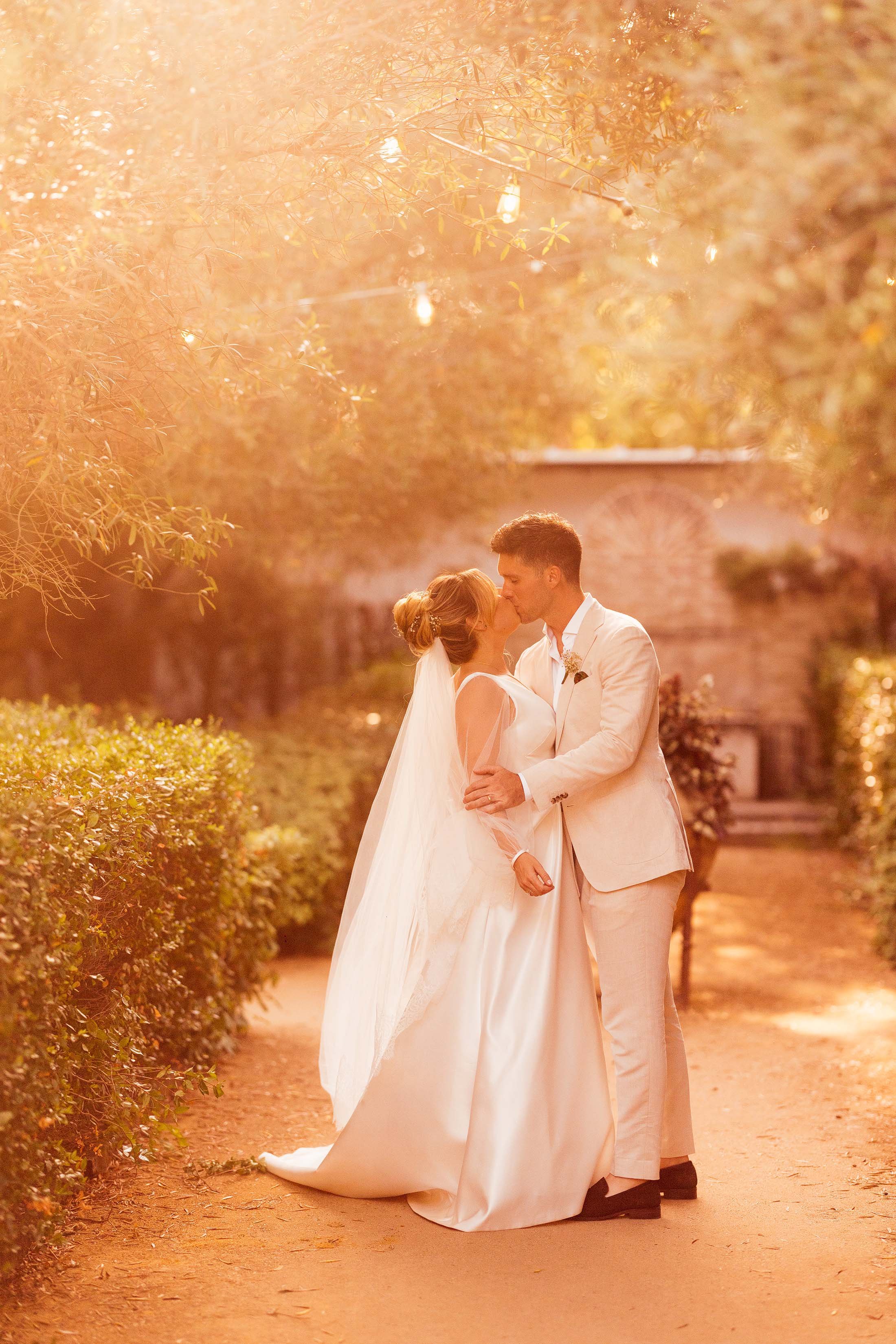 couple kiss at sunset in finca monasterio