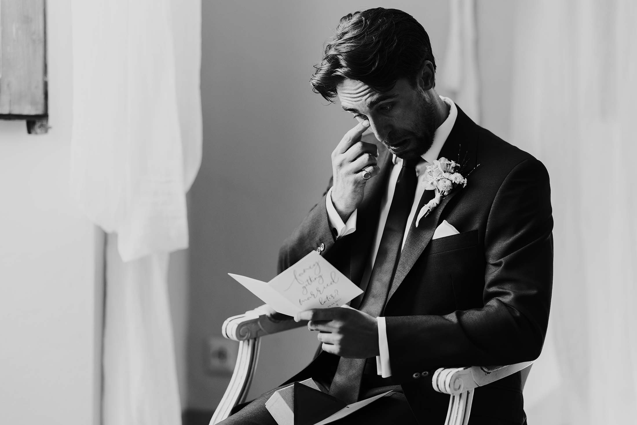groom sheds tear reading card from bride at villa di ulignano