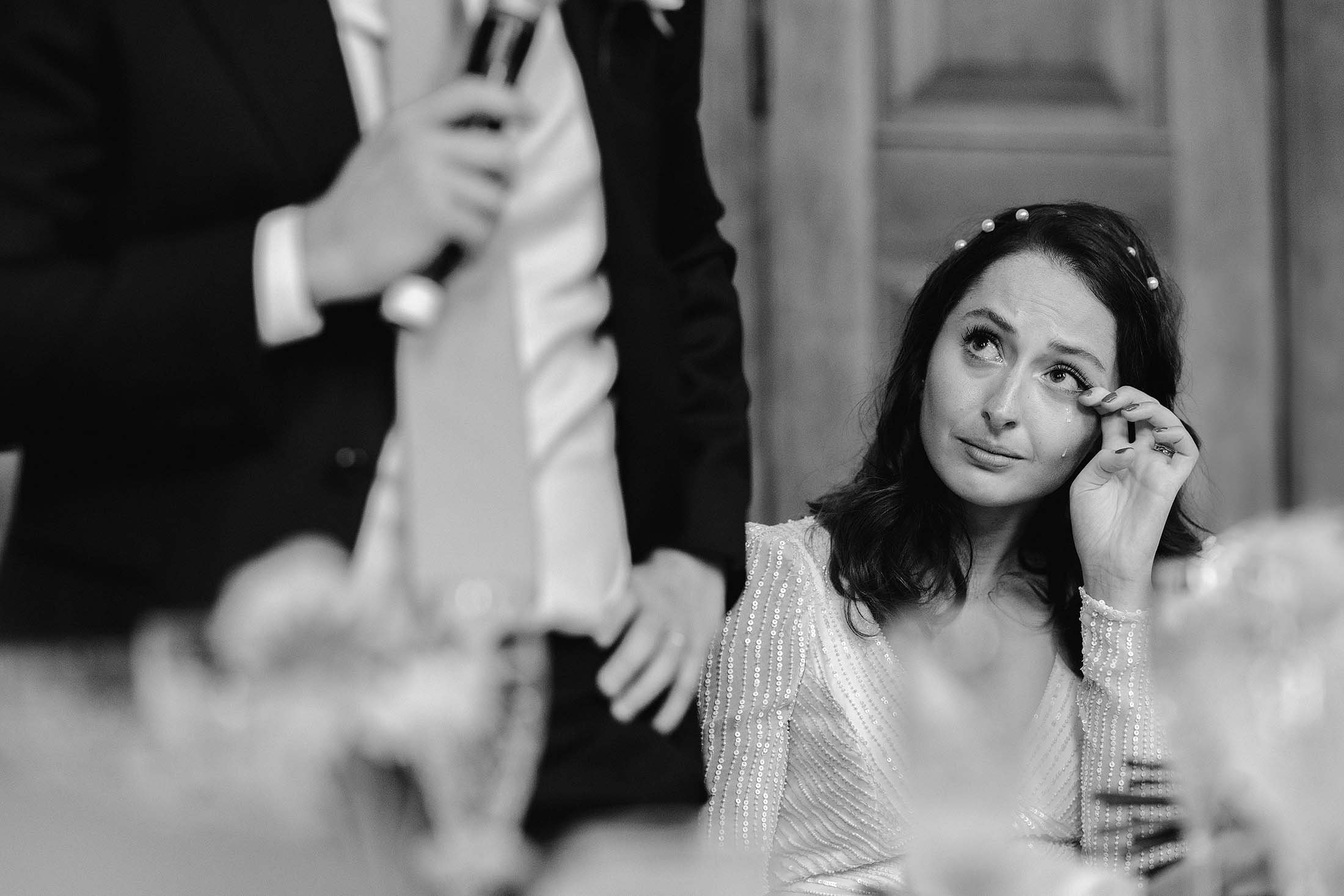 bride cries during groom speech at Ned wedding