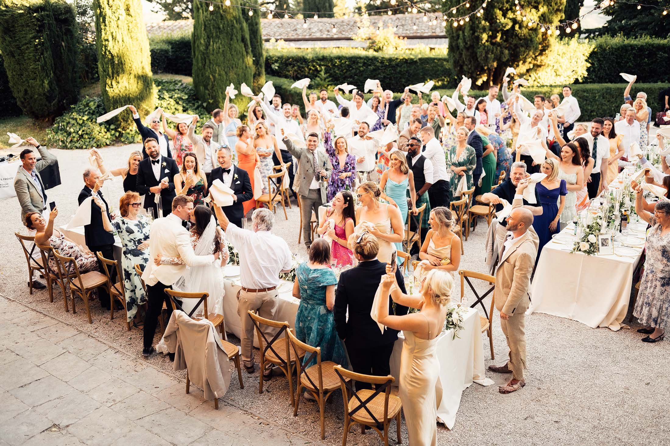 Wedding guests cheer at Villa di ulignano wedding