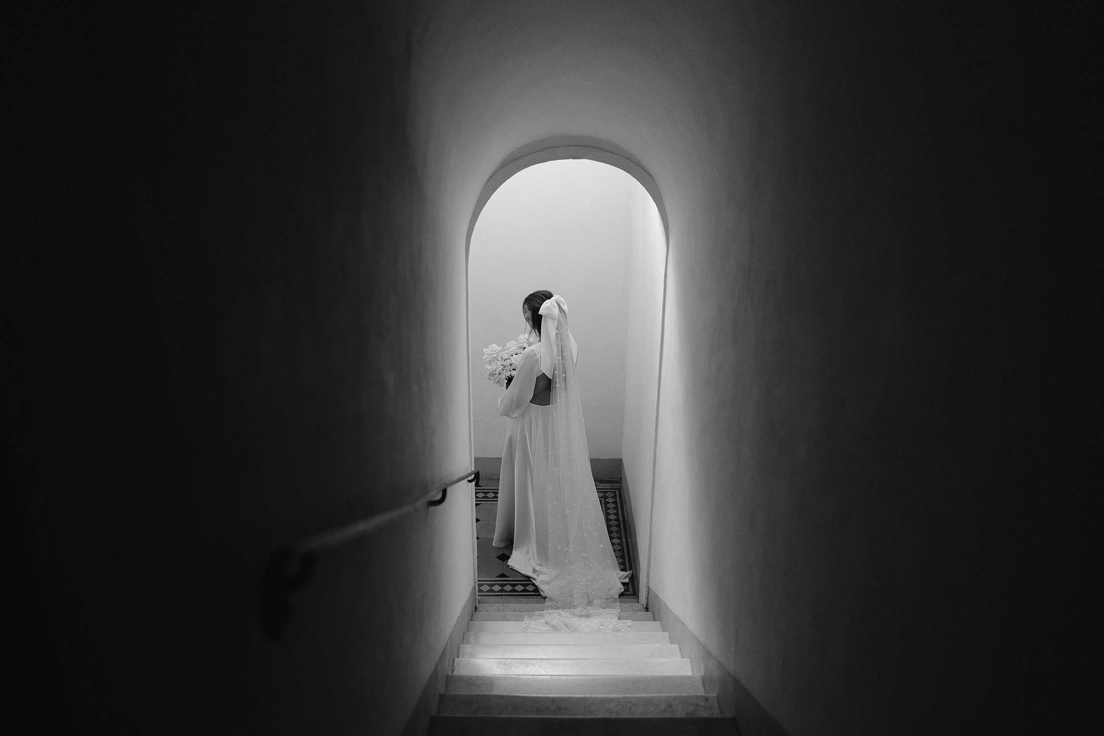 bride walks in tuscan wedding villa