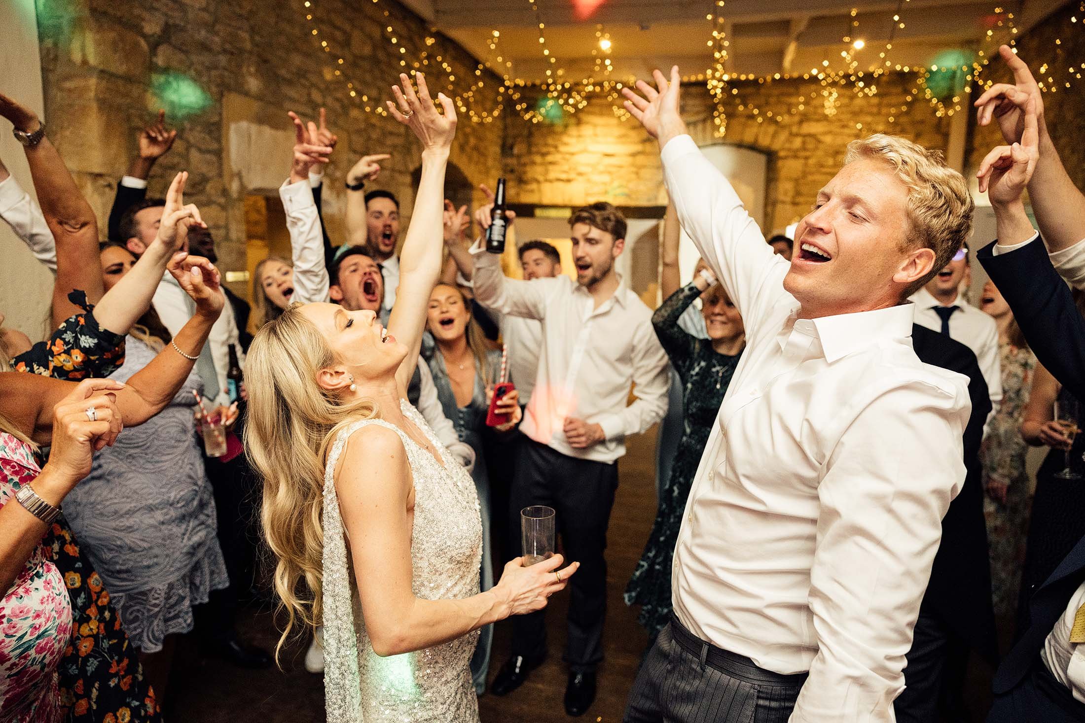 wedding party go wild on dancefloor at Brampton house