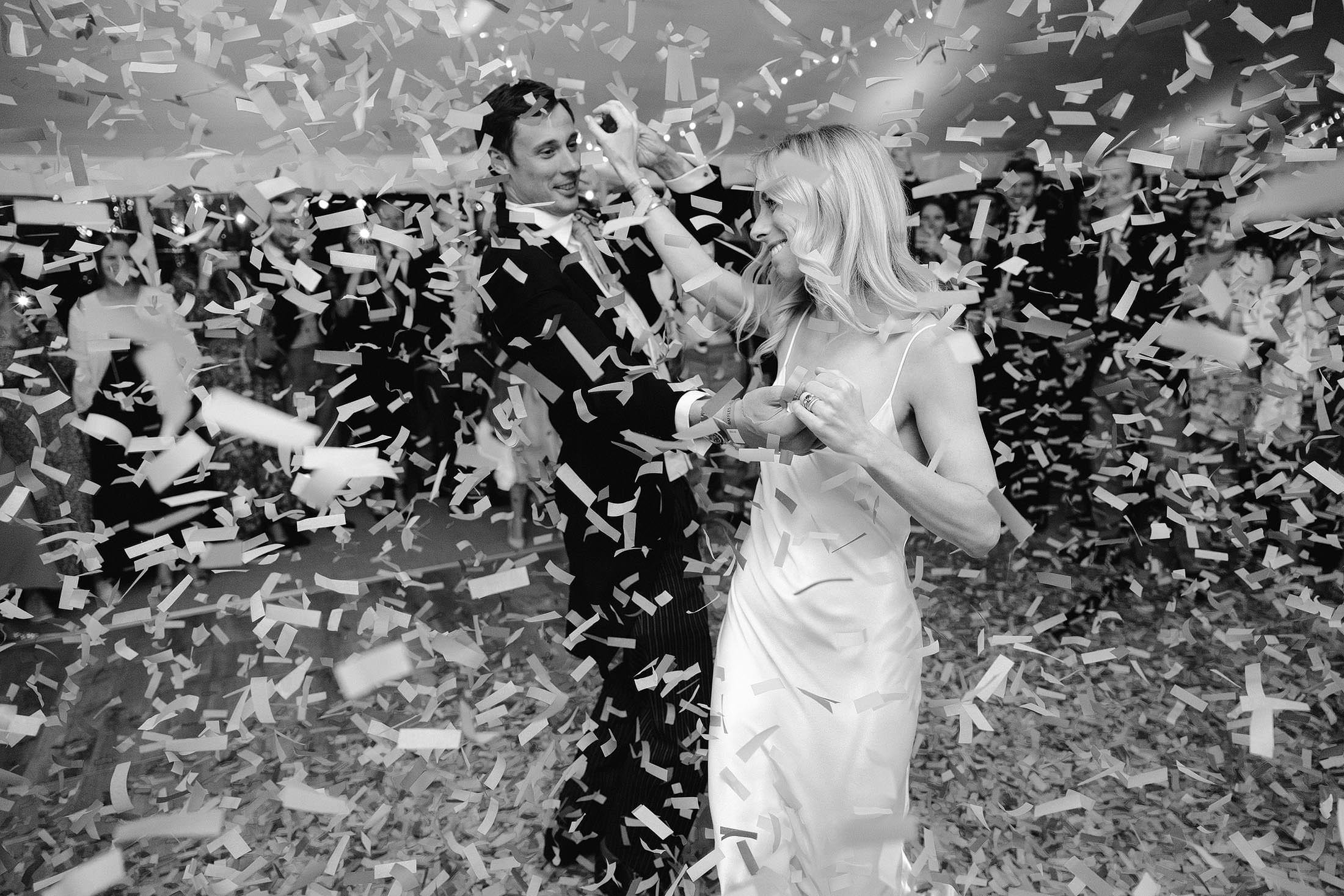 bride and groom first dance with confetti cannons for london battersea wedding
