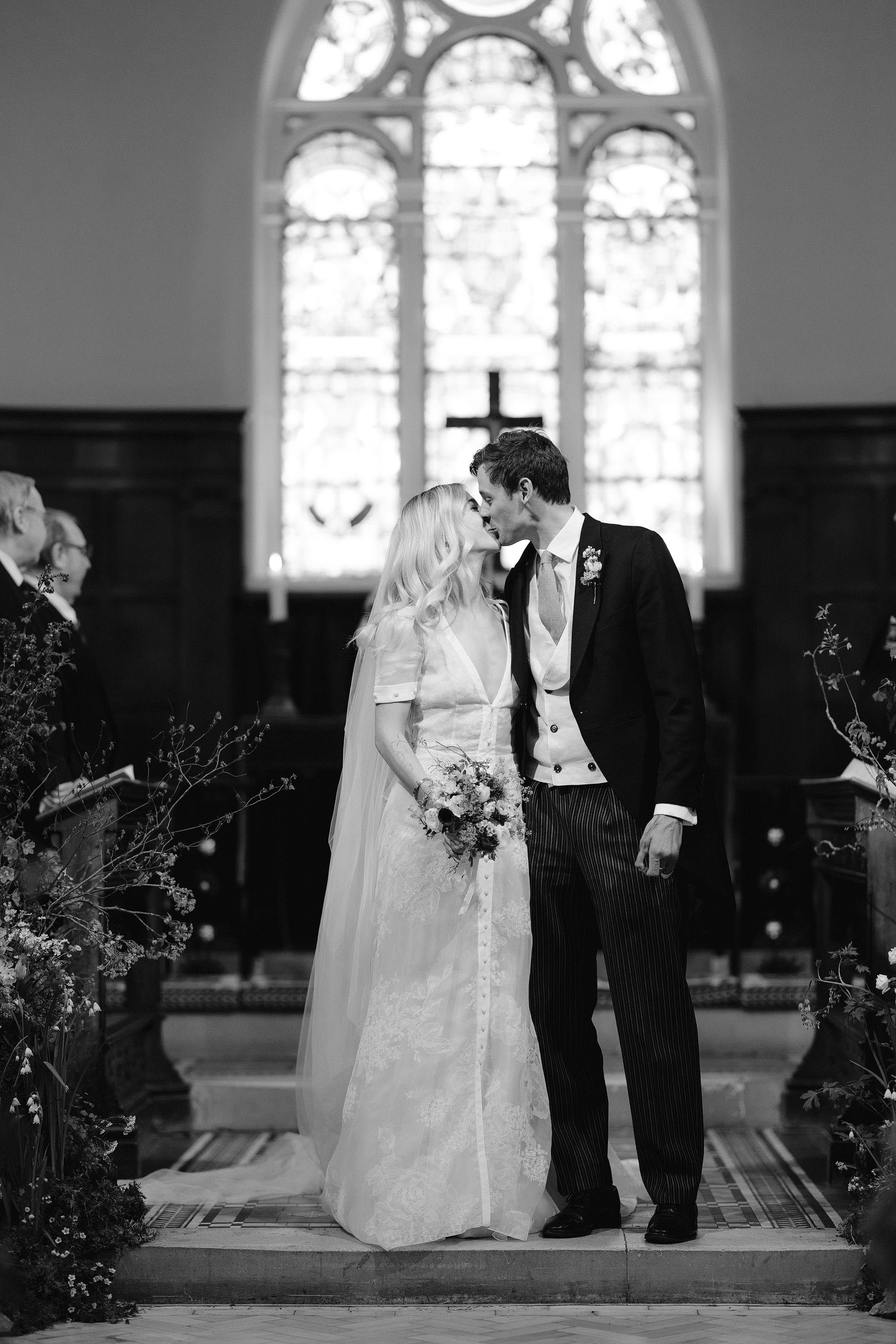 couple do first kiss at st mary's battersea wedding