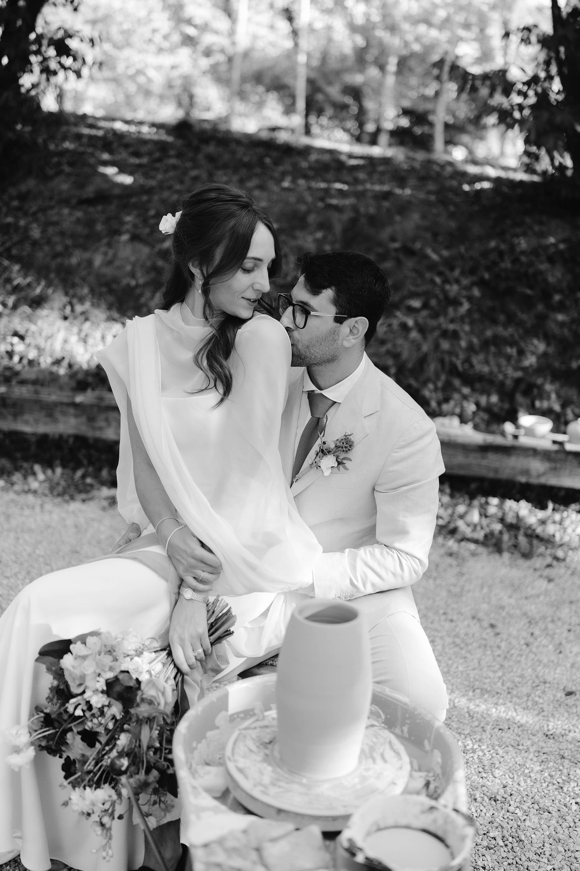 bride and groom pose for portraits at chateau de lartigolle france wedding