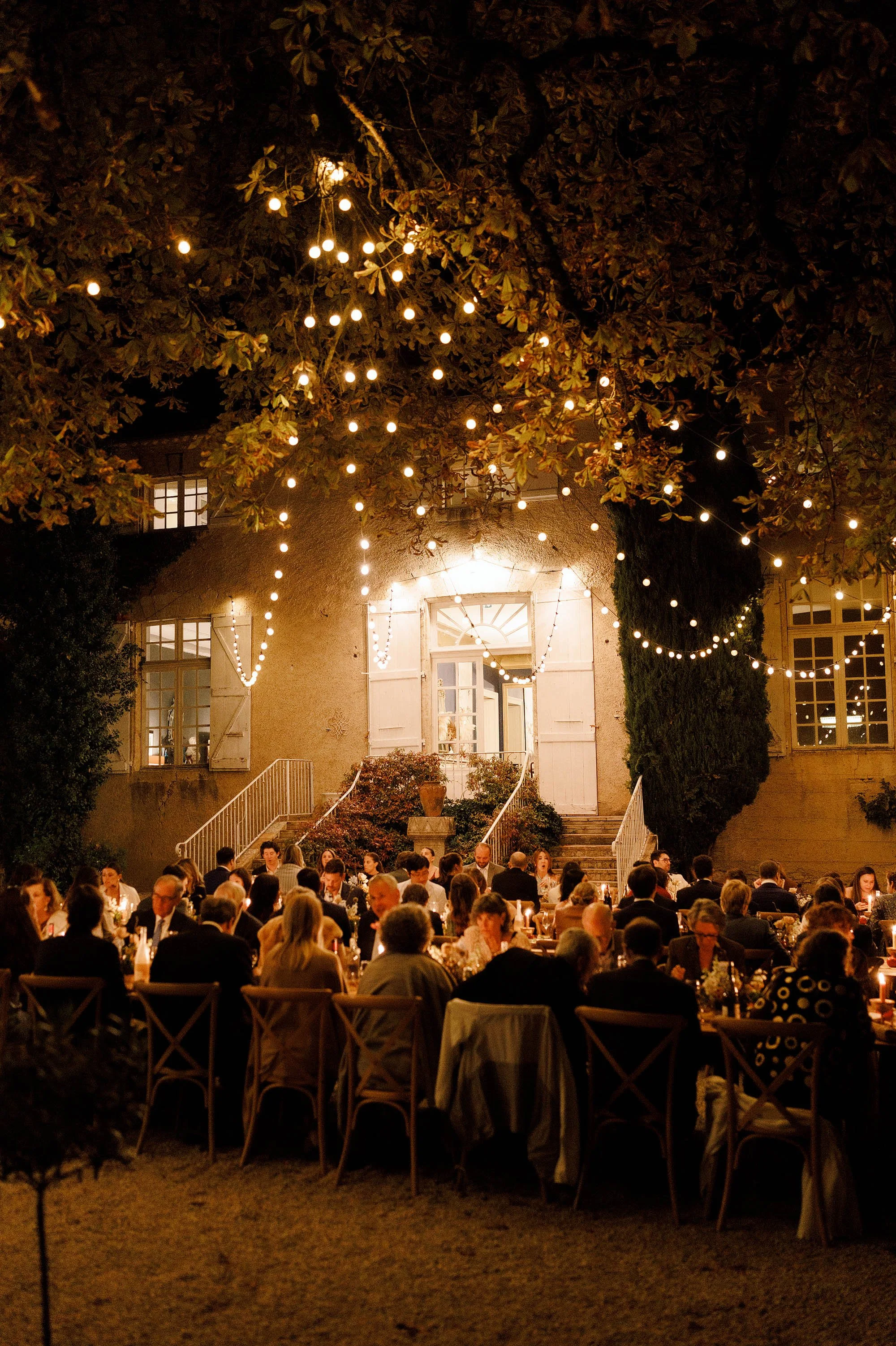 outdoor dinner at chateau de lartigolle france wedding venue