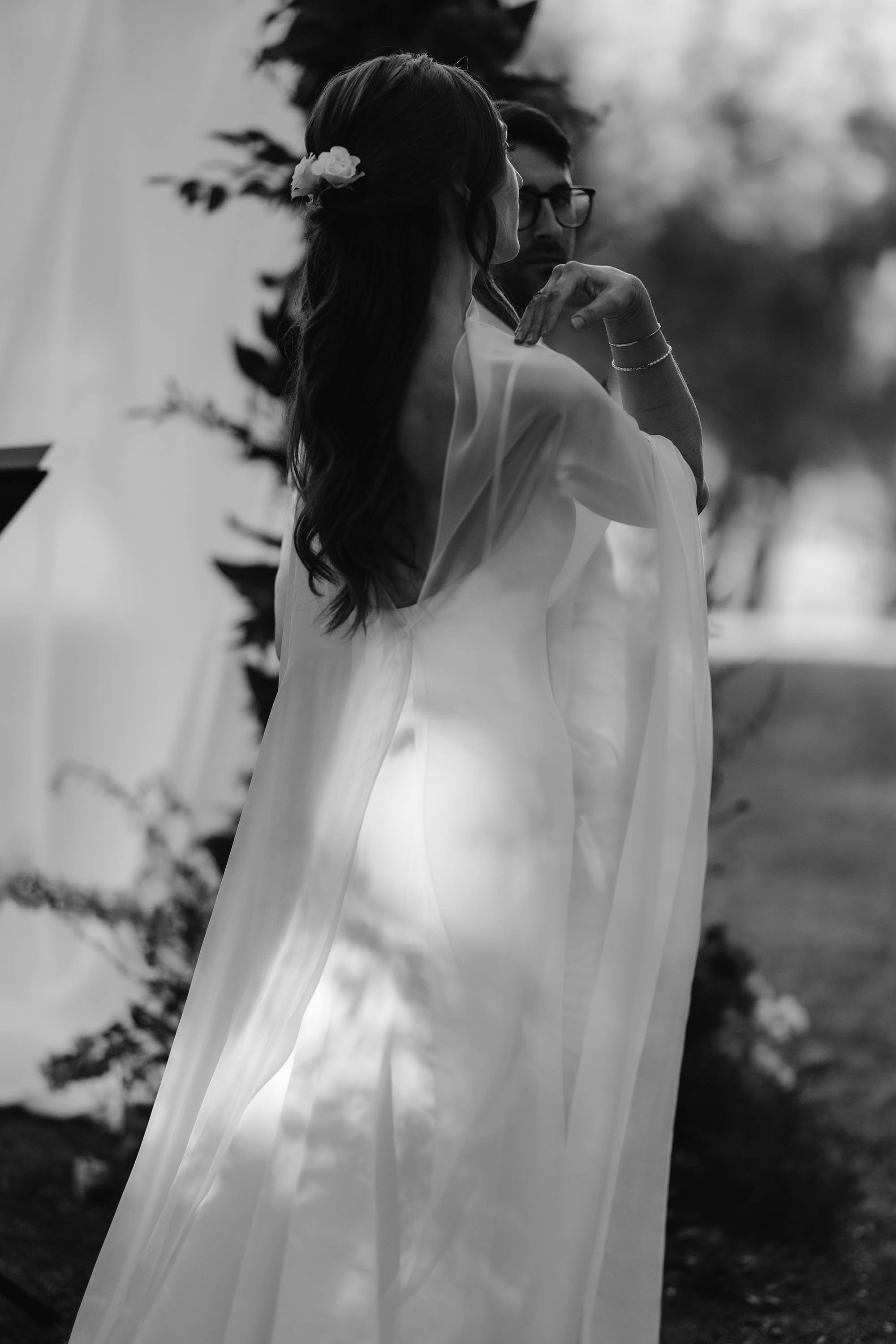 bride in jenny yoo nyc dress with stylish cape