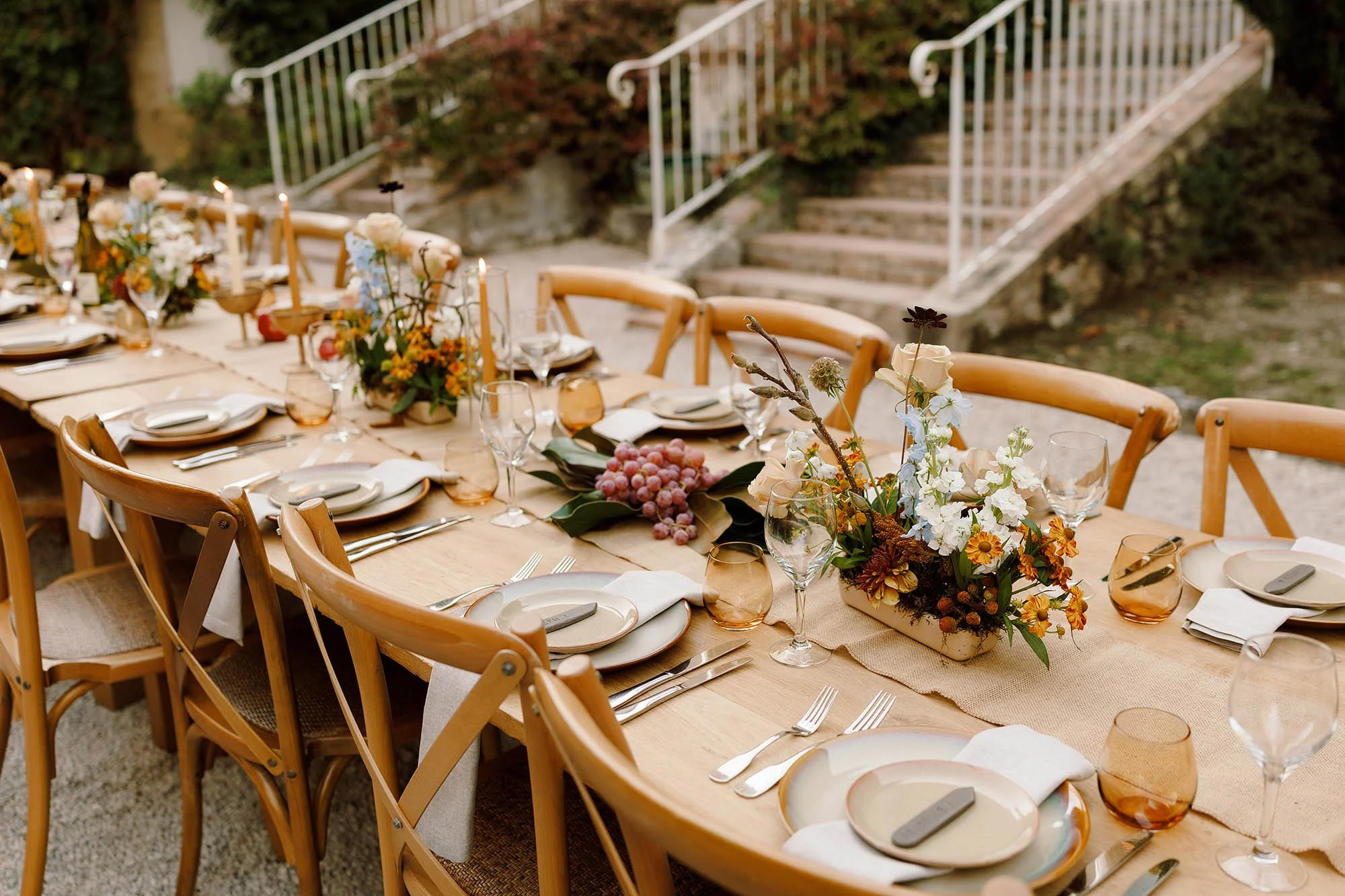 stylish tablescape at chateau de lartigolle wedding