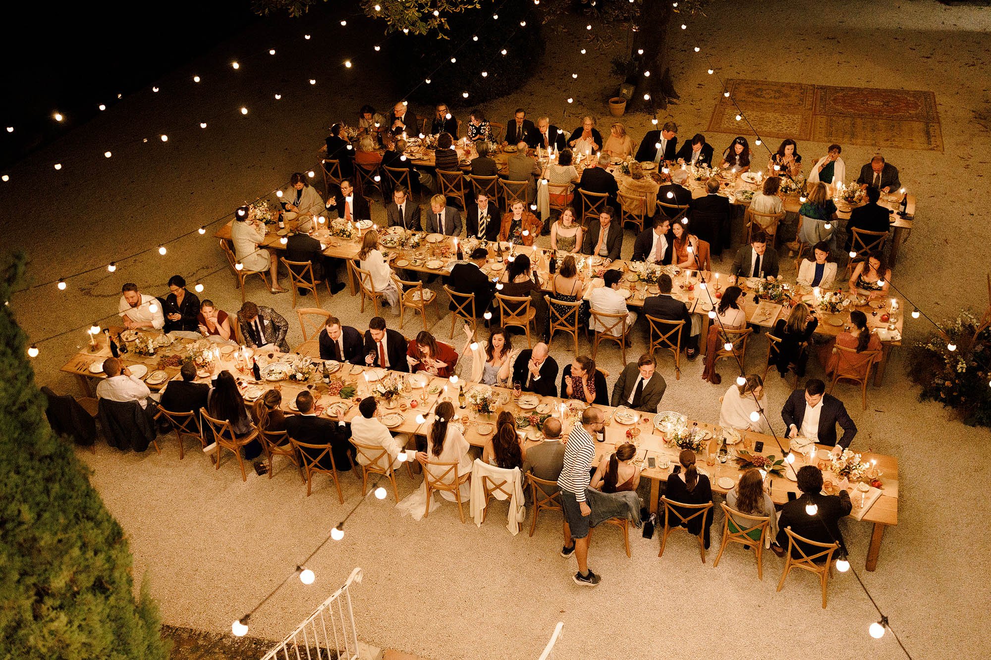 view of chateau de lartigolle courtyard during wedding dinner