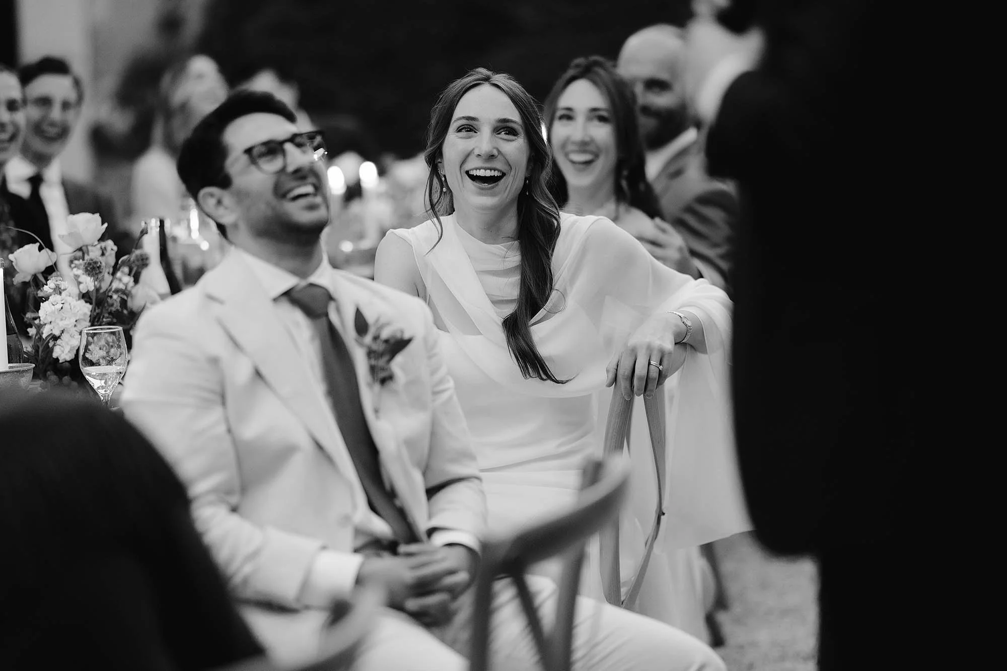 bride laughs during speeches